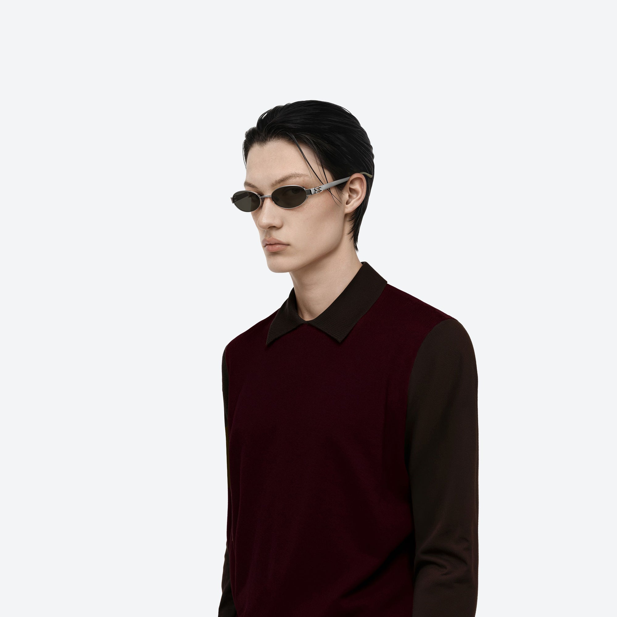 Model wearing the Cali 02 Silver Metal framed Oval sunglasses.