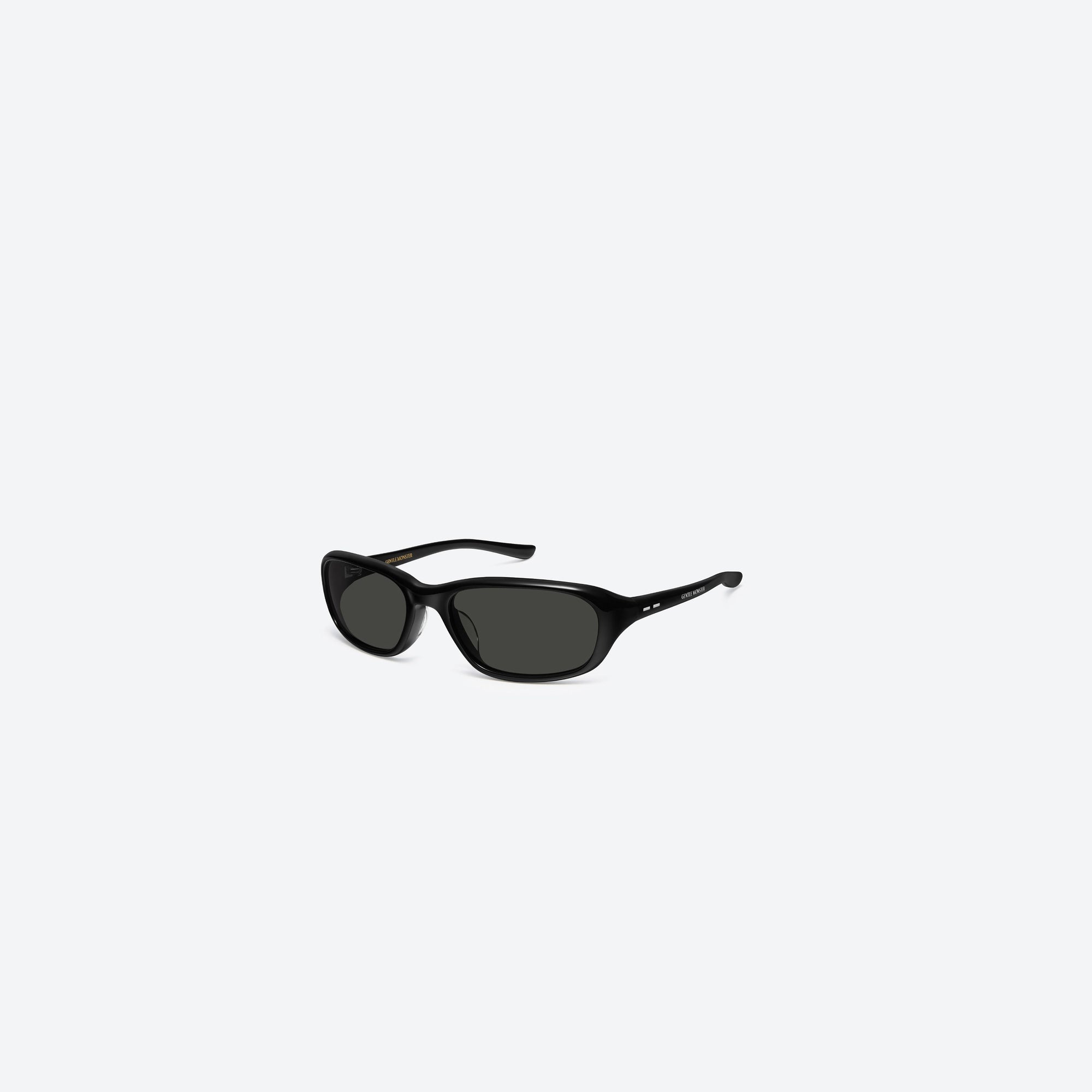 45-degree view of Gentle Monster Hills 01 Black Acetate framed Wraparound sunglasses.