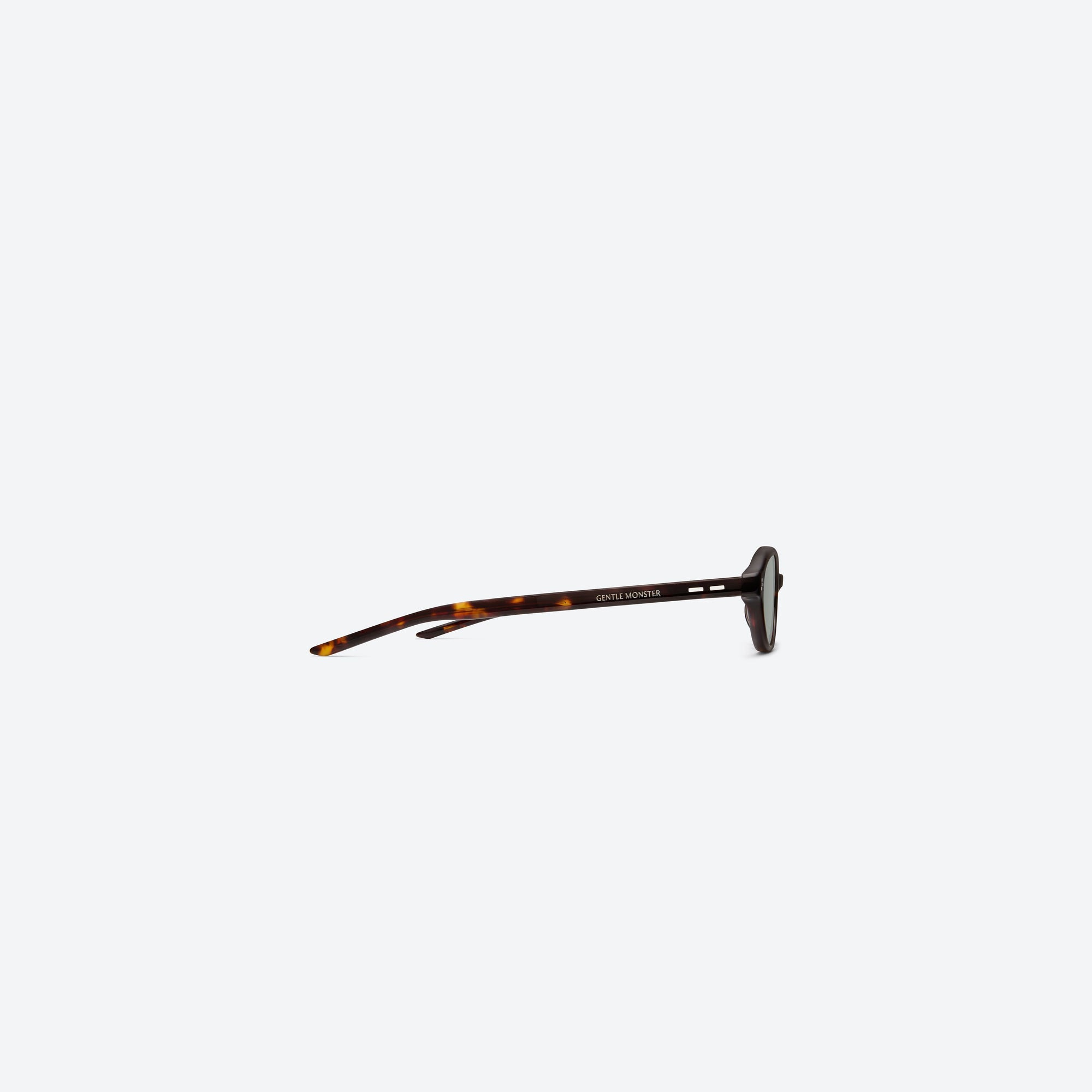 A detailed right view of Gentle Monster La Cha T1 Tortoise Acetate framed Round sunglasses.