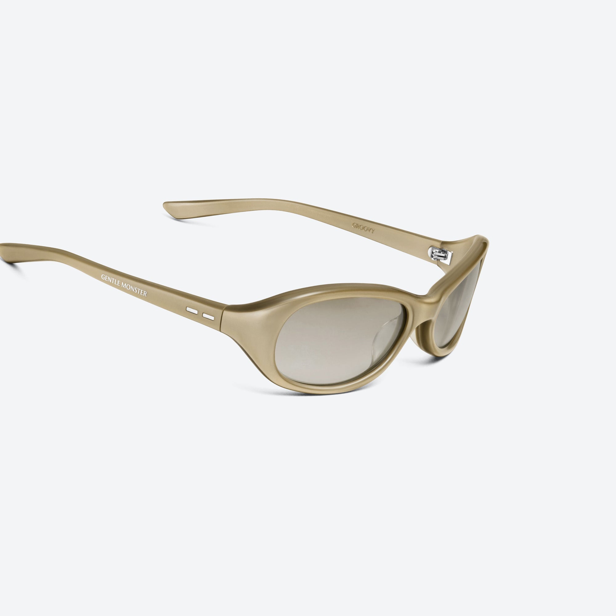 45-degree detailed view of Gentle Monster Groovy GDC2 Gold Acetate framed Wraparound sunglasses.