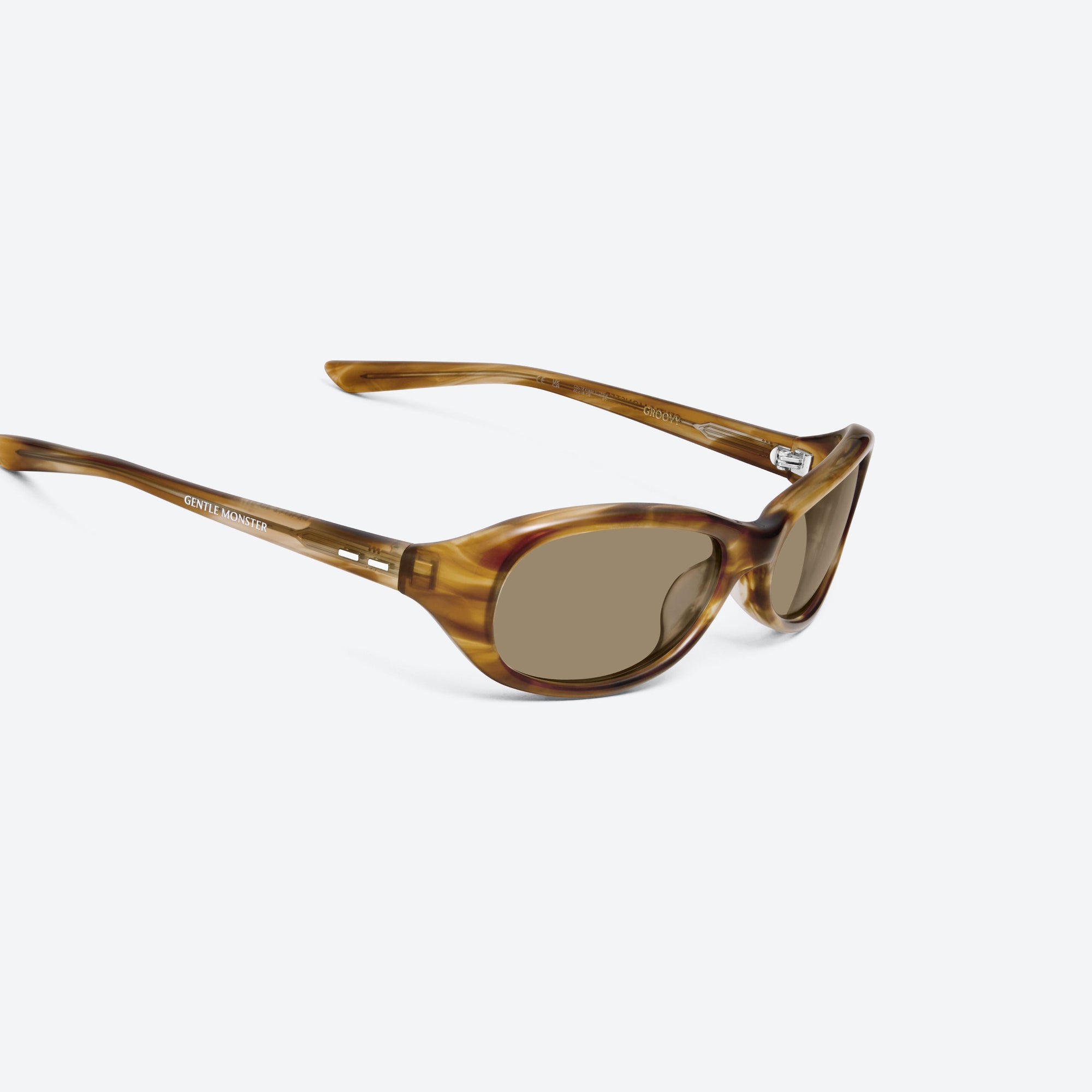 45-degree detailed view of Gentle Monster Groovy T8 Tortoise Acetate framed Wraparound sunglasses.