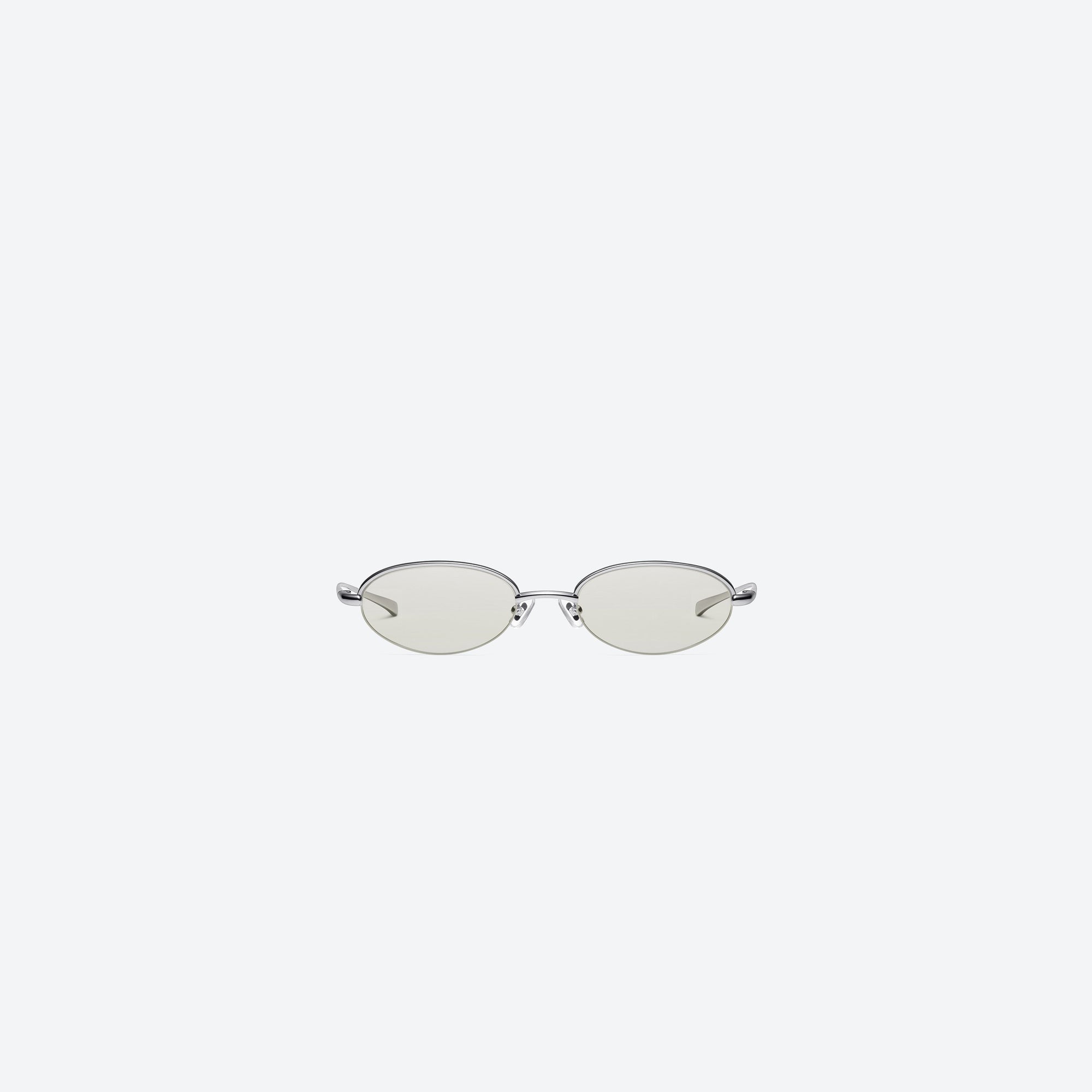 A front view of Gentle Monster Kota 02(GRM) Similar Silver Metal framed Oval sunglasses.