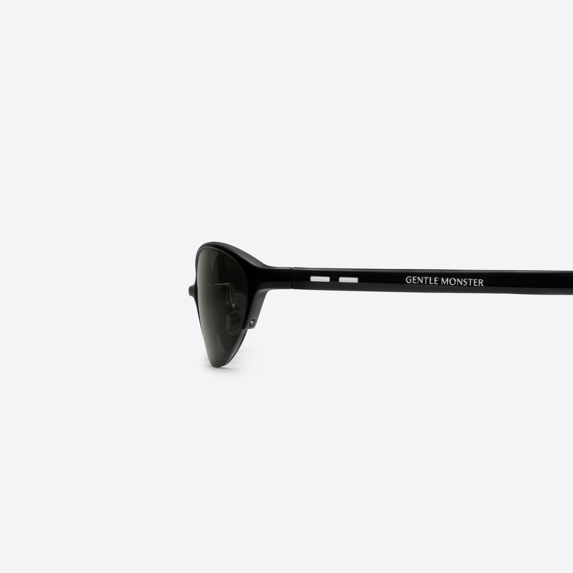 A detailed left view of Gentle Monster Limes 01 Black Mixed framed Cat-eye sunglasses.