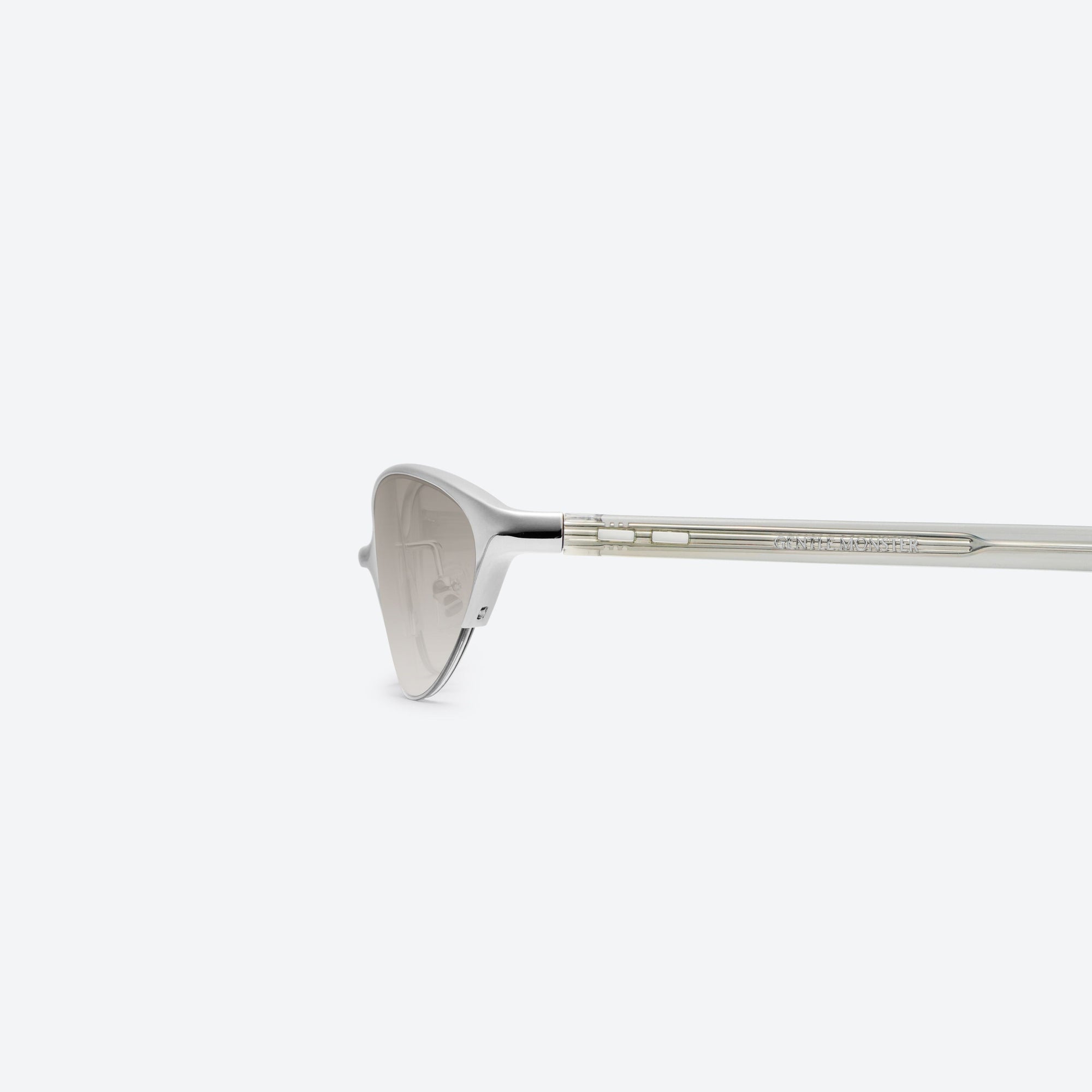 A detailed left view of Gentle Monster Limes 02(BR) Similar Silver Mixed framed Cat-eye sunglasses.