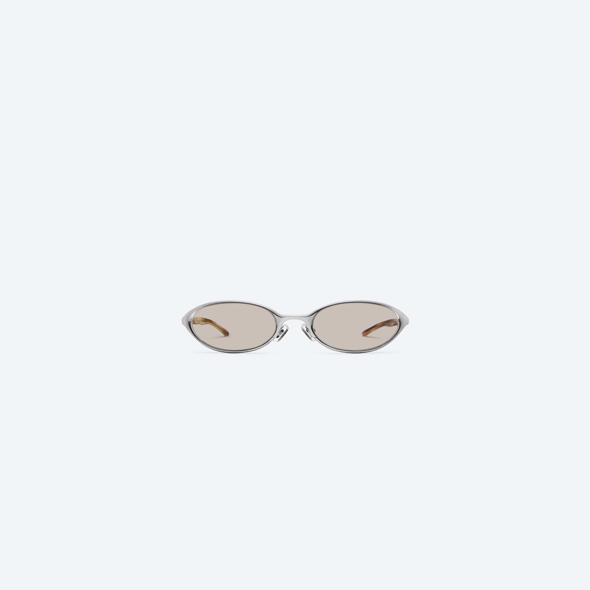A front view of Gentle Monster Moody 02(BR) Similar Silver Mixed framed Oval sunglasses.