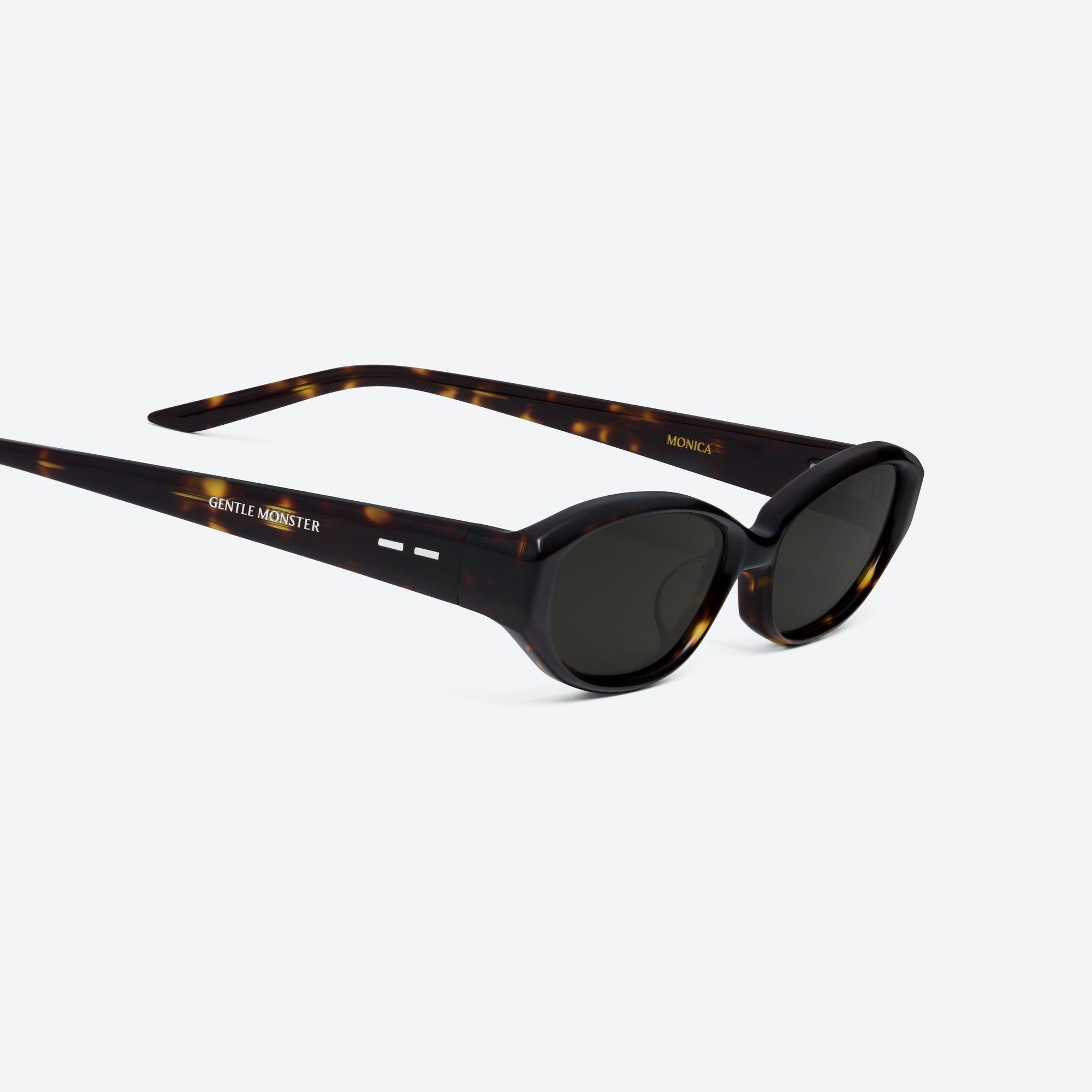45-degree detailed view of Gentle Monster Monica T9 Tortoise Acetate framed Cat-eye sunglasses.
