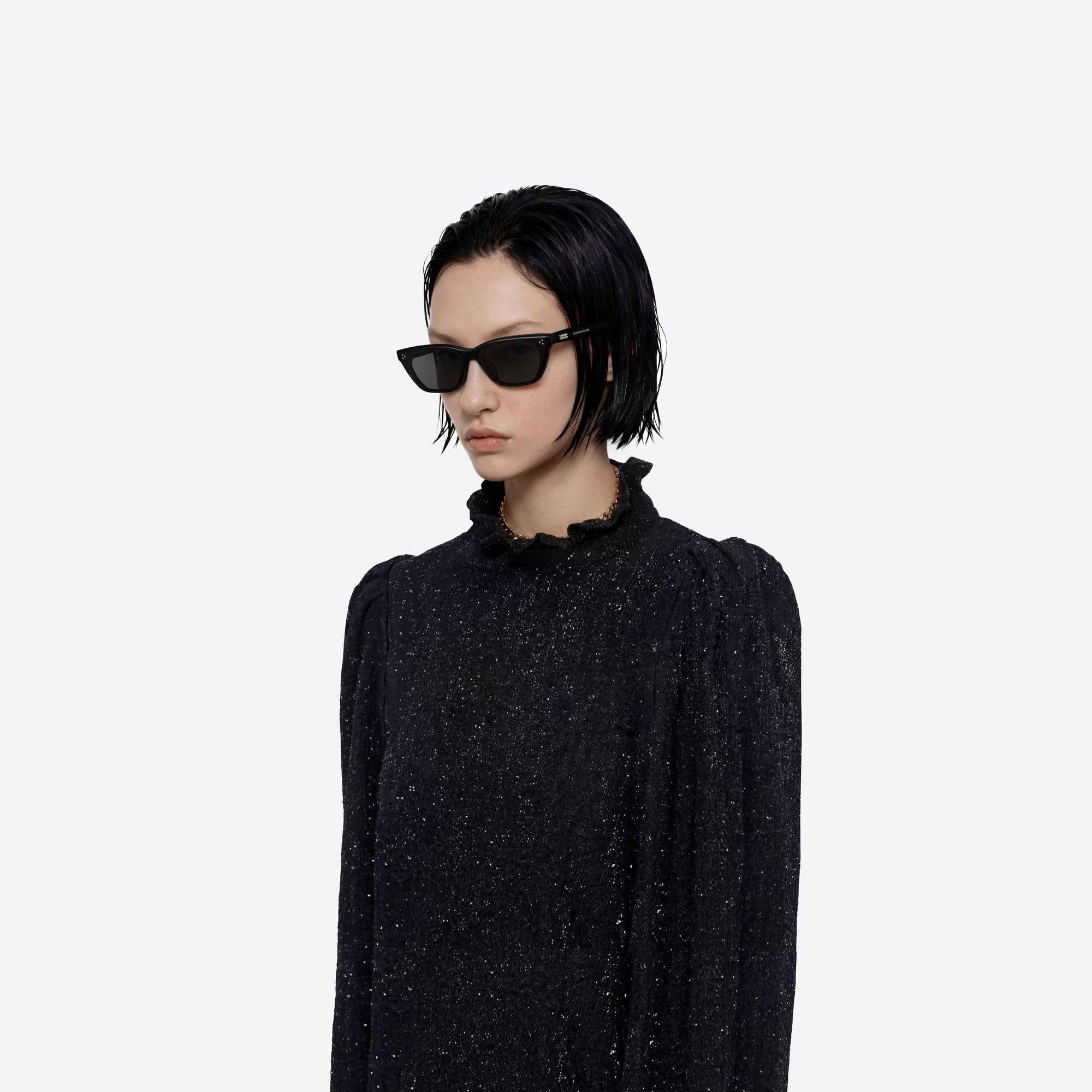 Model wearing the Dodo 01 Black Acetate framed Cat-eye sunglasses.