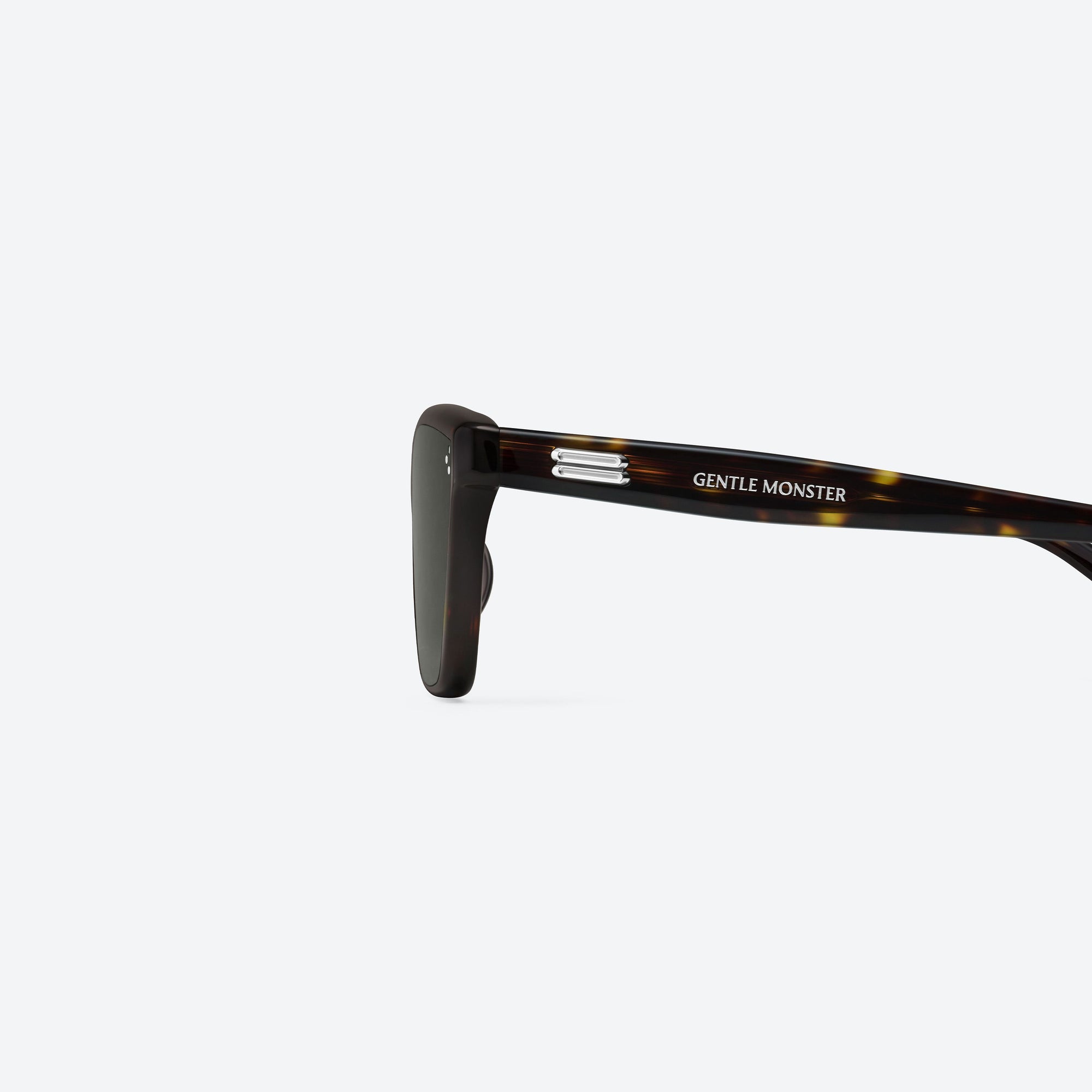 A detailed left view of Gentle Monster Dodo T9 Tortoise Acetate framed Cat-eye sunglasses.