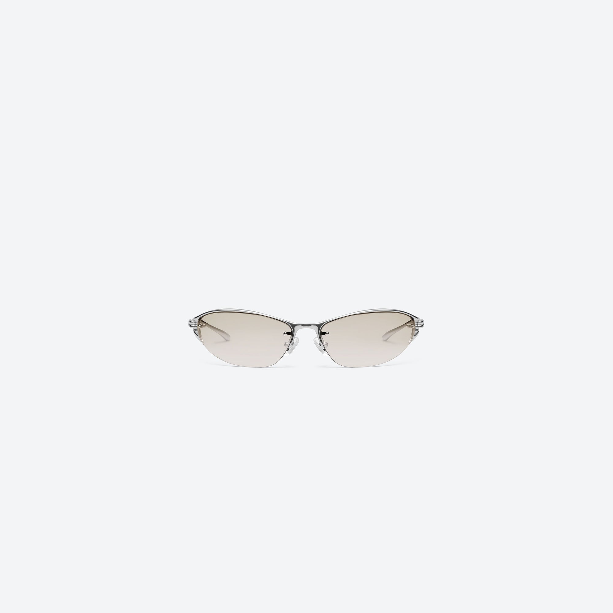 A front view of Gentle Monster Futura 02 Silver Metal framed Wraparound sunglasses.