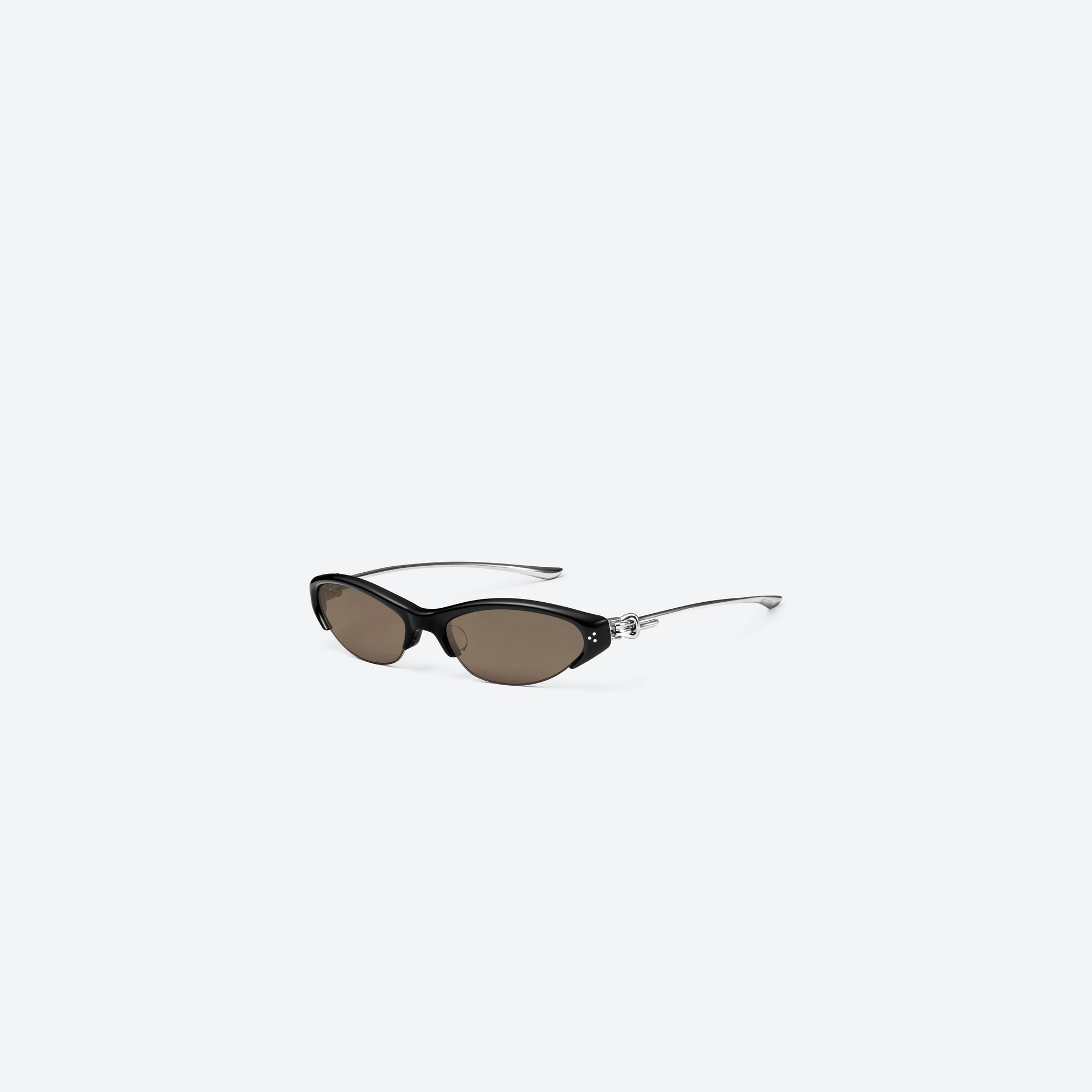 45-degree view of Gentle Monster Tweed 01 Black Mixed framed Cat-eye sunglasses.