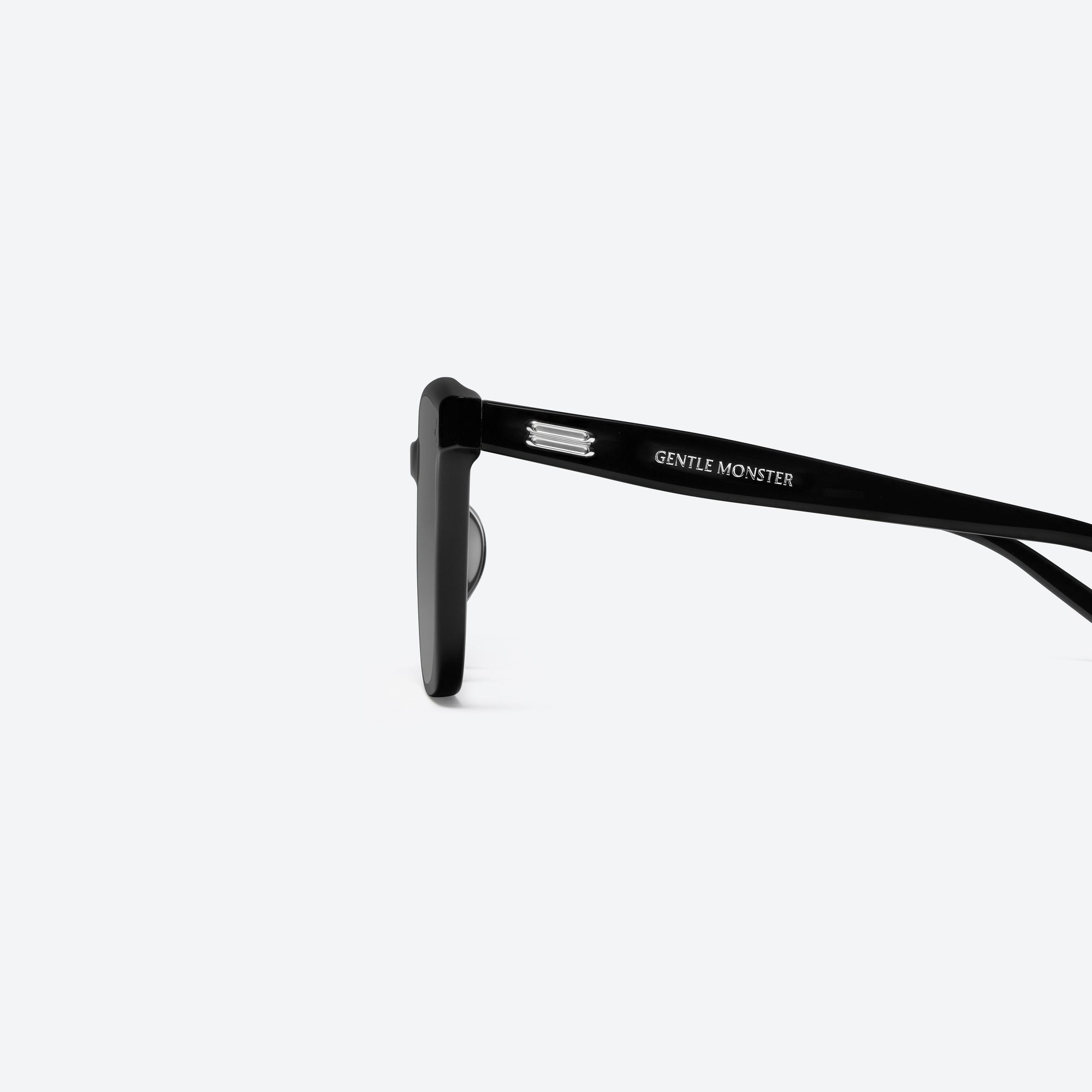 A detailed left view of Gentle Monster Gent 01 Black Acetate framed Square sunglasses.