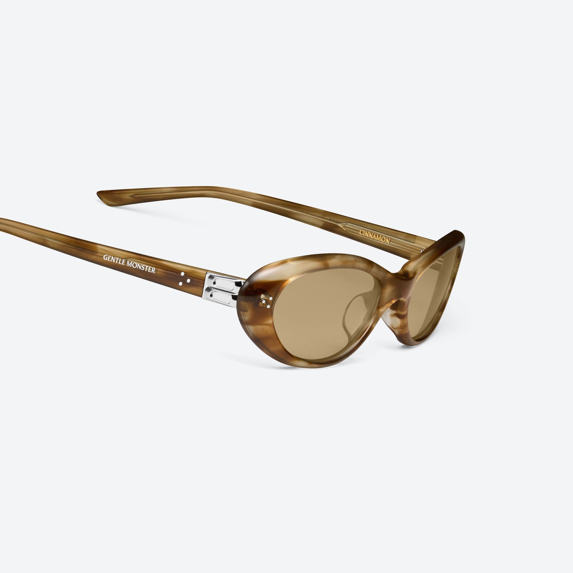 45-degree detailed view of Gentle Monster Cinnamon T8 Tortoise Acetate framed Oval sunglasses.