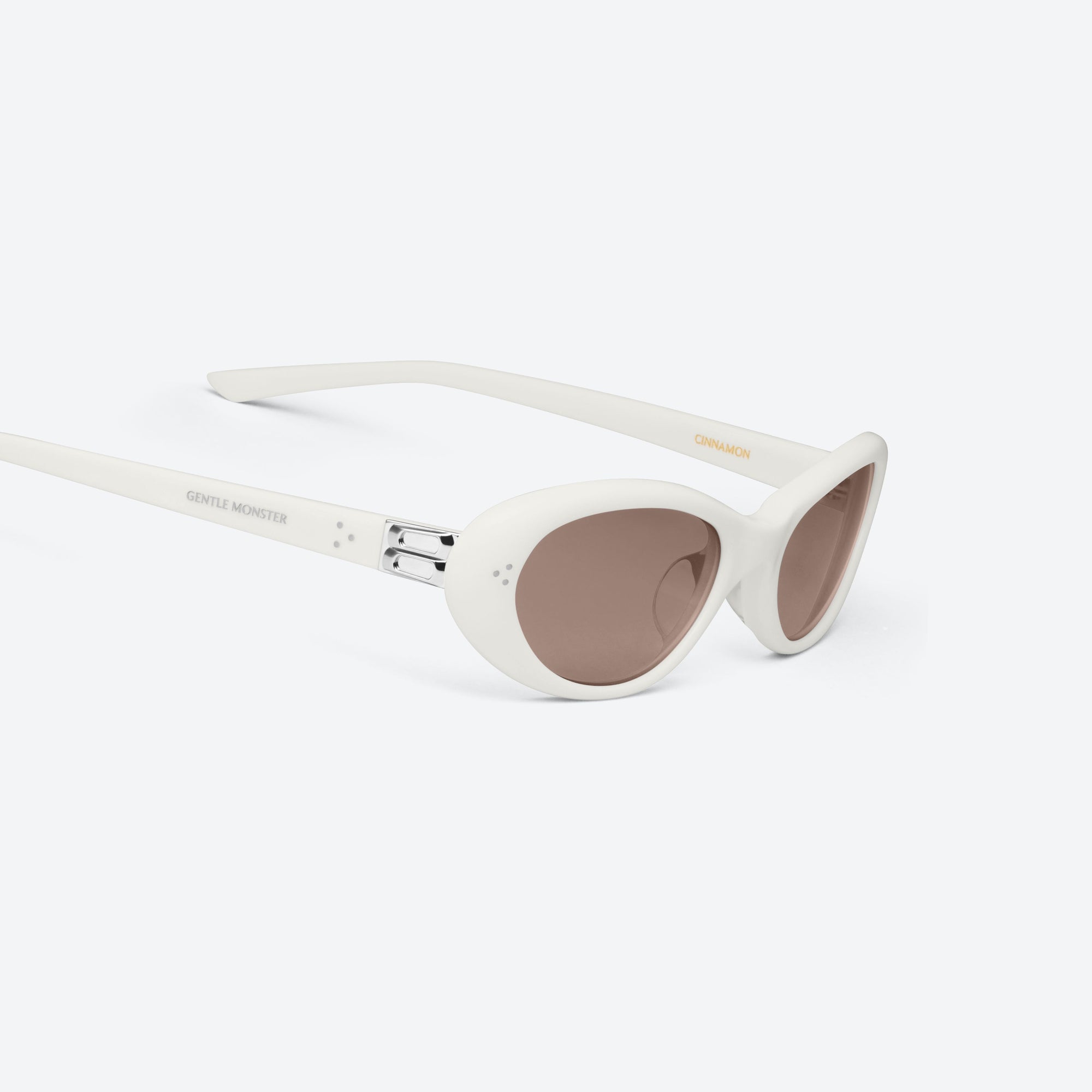 45-degree detailed view of Gentle Monster Cinnamon W2 White Acetate framed Oval sunglasses.