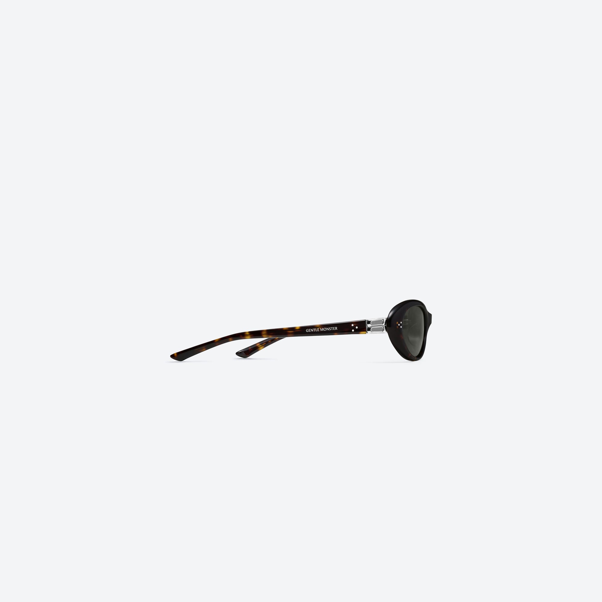 A detailed right view of Gentle Monster Cinnamon T9 Tortoise Acetate framed Oval sunglasses.