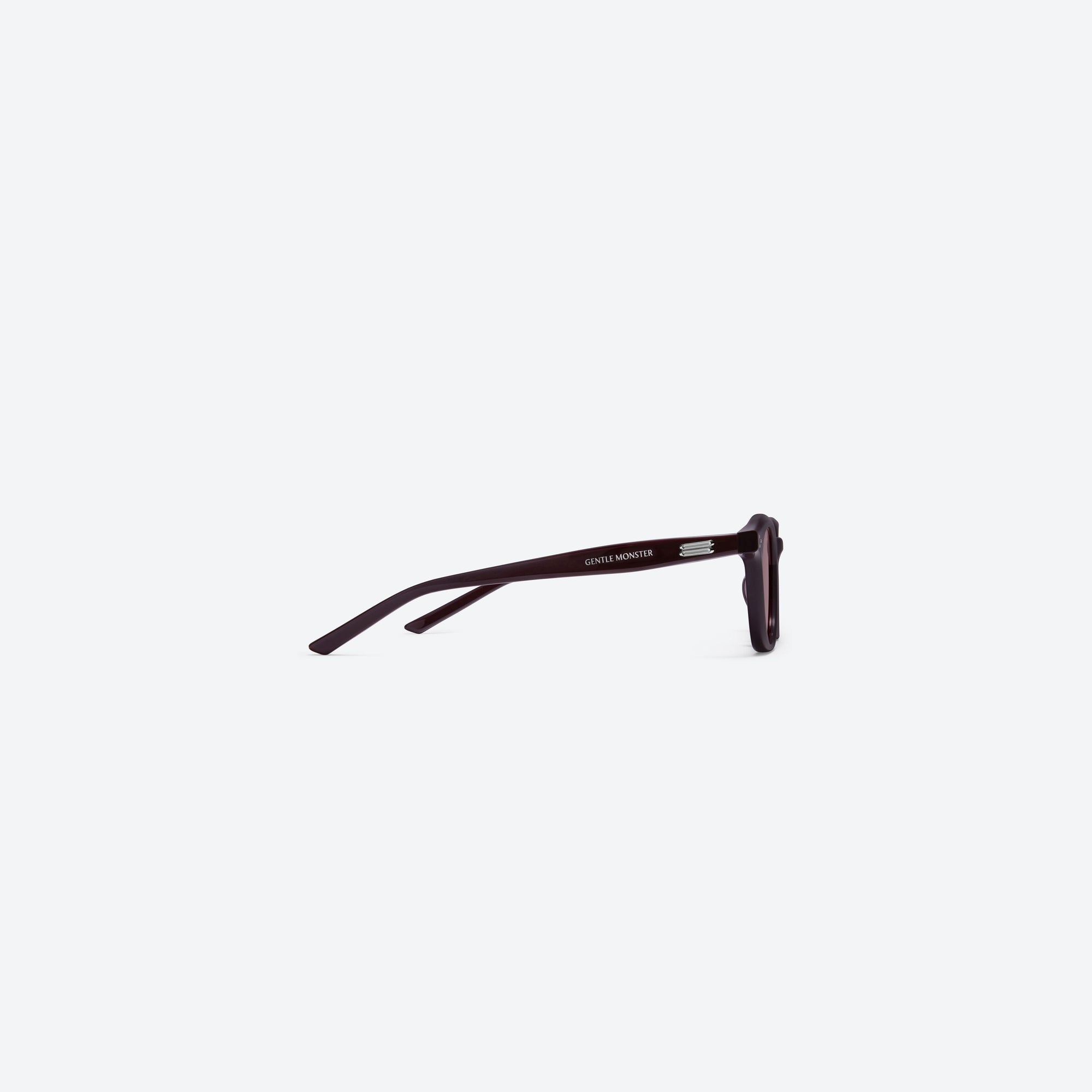 A detailed right view of Gentle Monster Noho R12 Red Acetate framed Round sunglasses.