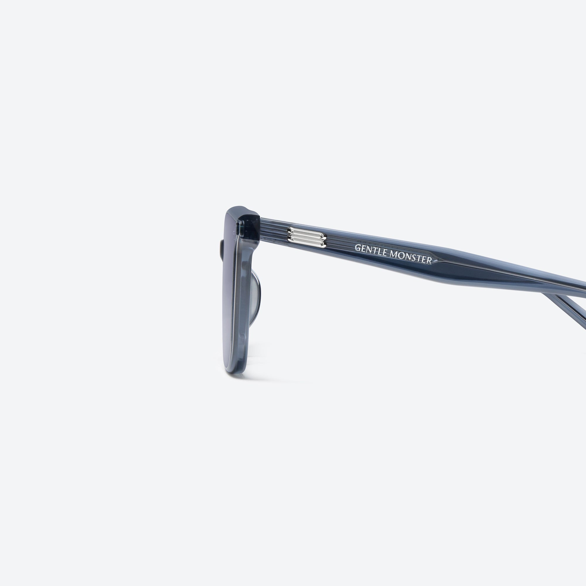 A detailed left view of Gentle Monster Lo Lou BLC11 Blue Acetate framed Square sunglasses.