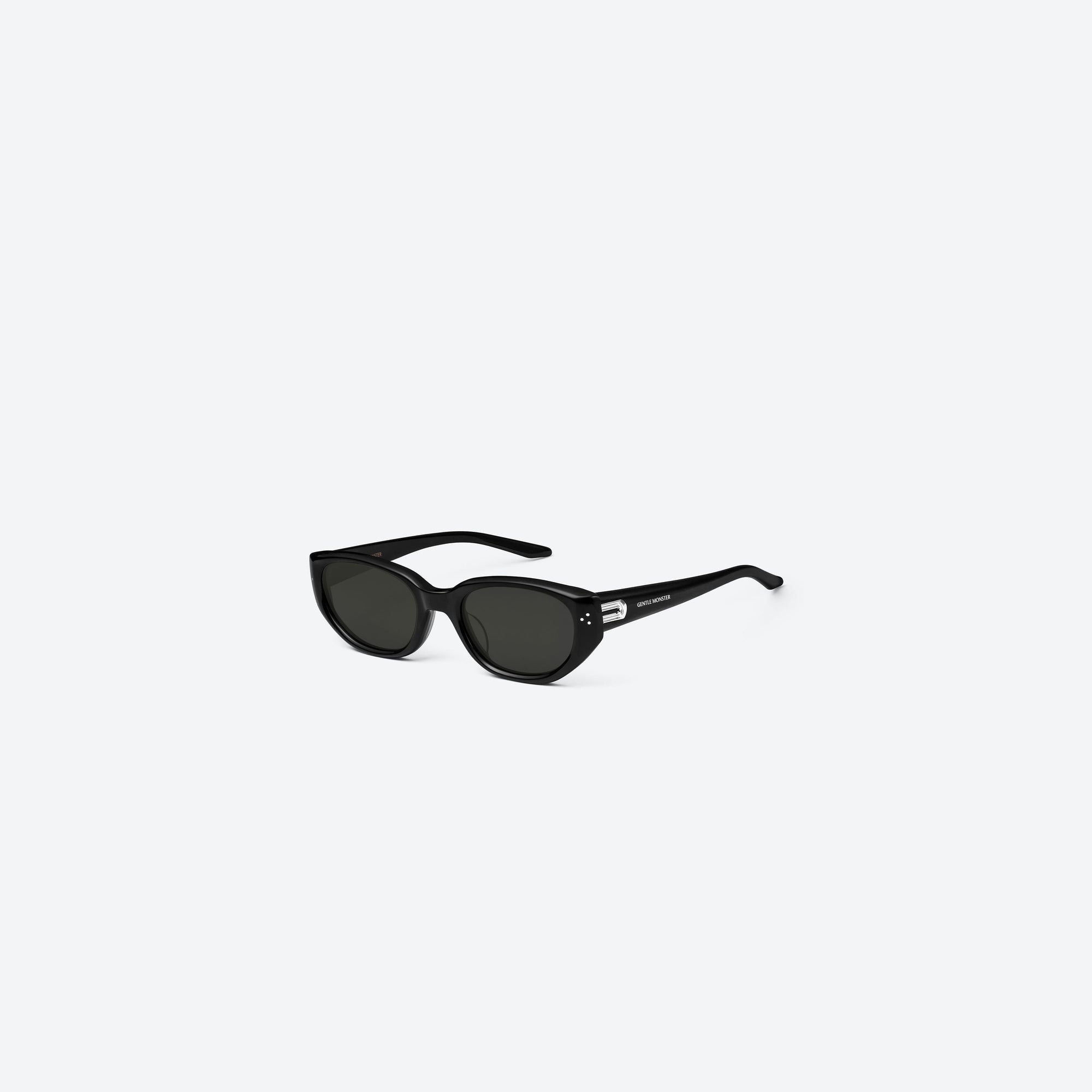 45-degree view of Gentle Monster Boni 01 Black Acetate framed Cat-eye sunglasses.