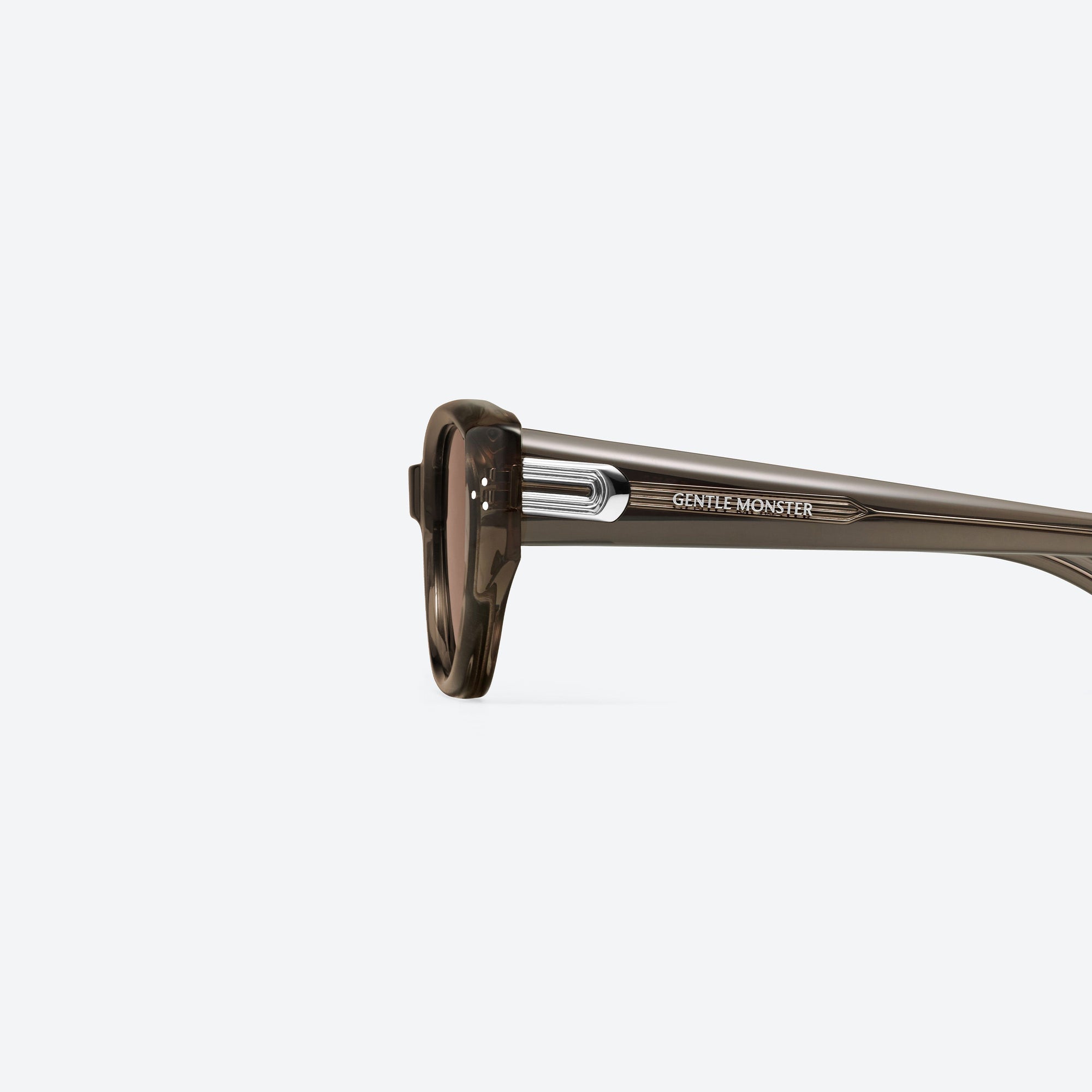 A detailed left view of Gentle Monster Boni BRC17 Brown Acetate framed Cat-eye sunglasses.