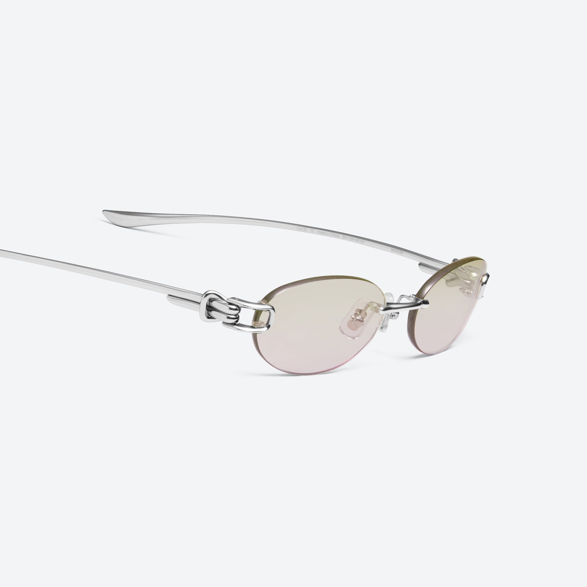 45-degree detailed view of Gentle Monster Musubi 02(BRG) Silver Metal framed Oval sunglasses.