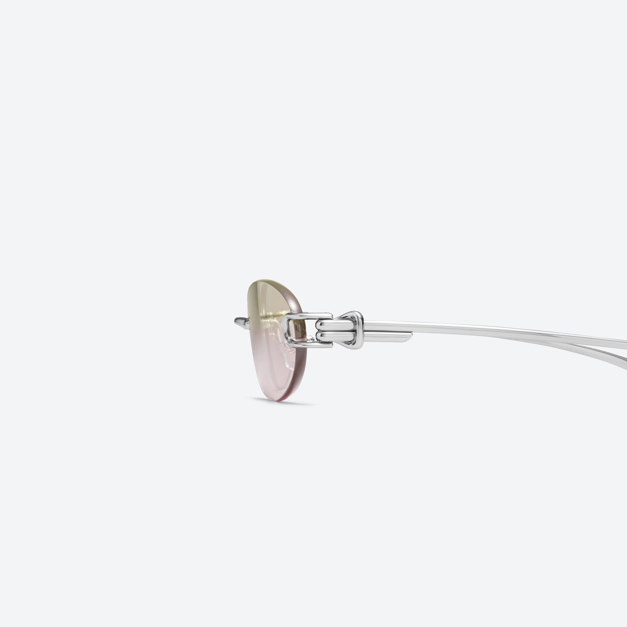 A detailed left view of Gentle Monster Musubi 02(BRG) Silver Metal framed Oval sunglasses.