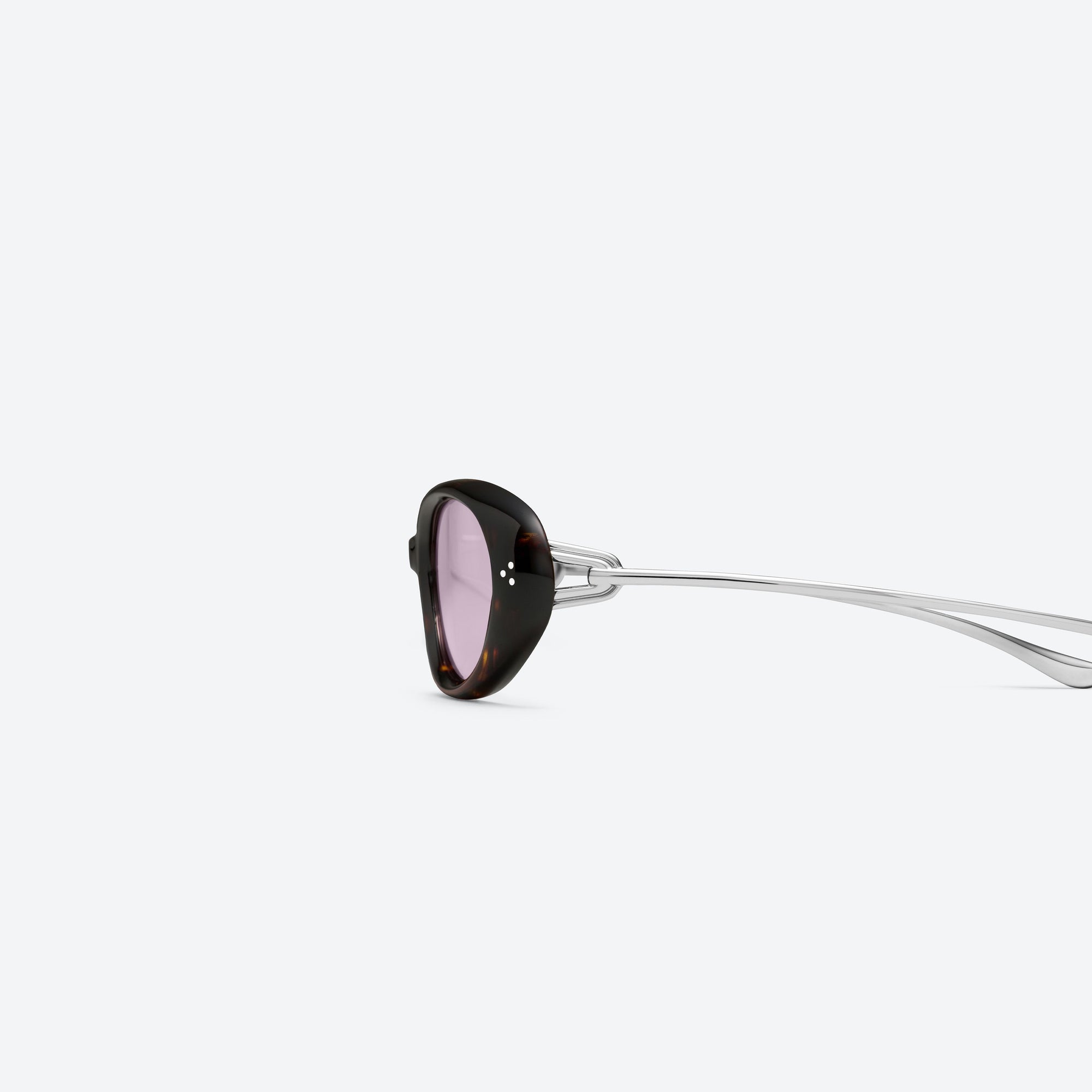 A detailed left view of Gentle Monster Ora T9 Tortoise Mixed framed Oval sunglasses.