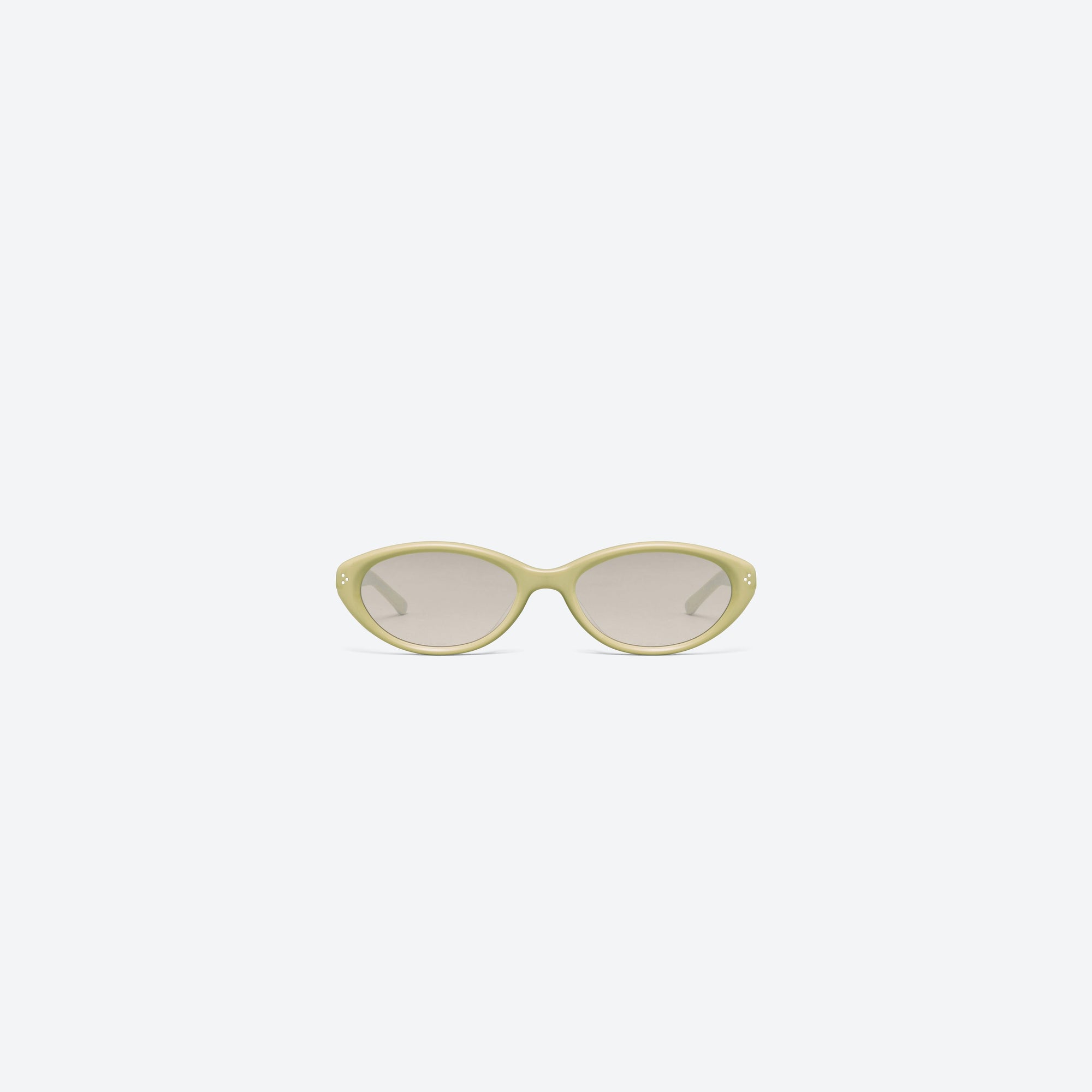 A front view of Gentle Monster Cuscus Y11 Yellow Acetate framed Oval sunglasses.