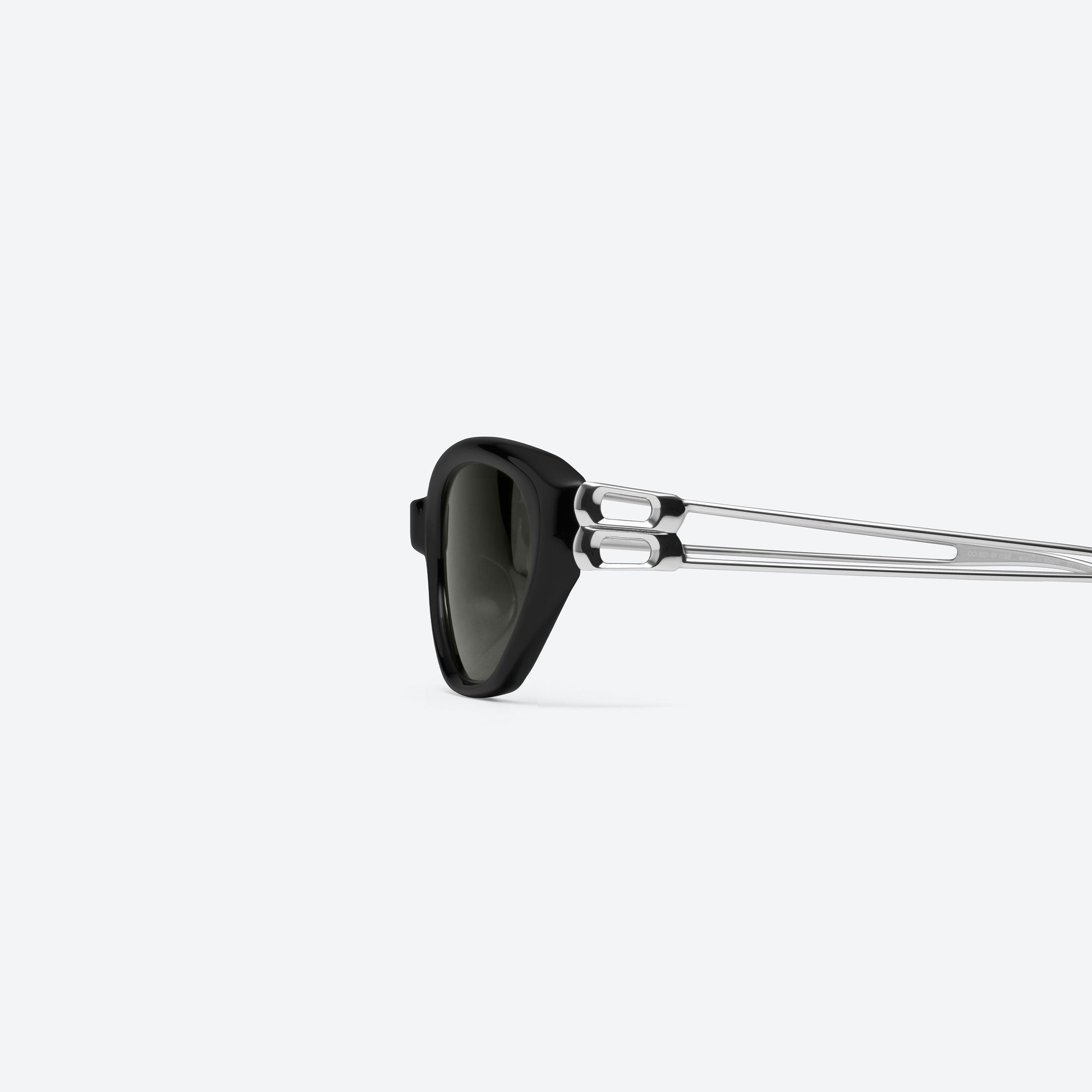 A detailed left view of Gentle Monster Mimosa 01 Black Mixed framed Cat-eye sunglasses.