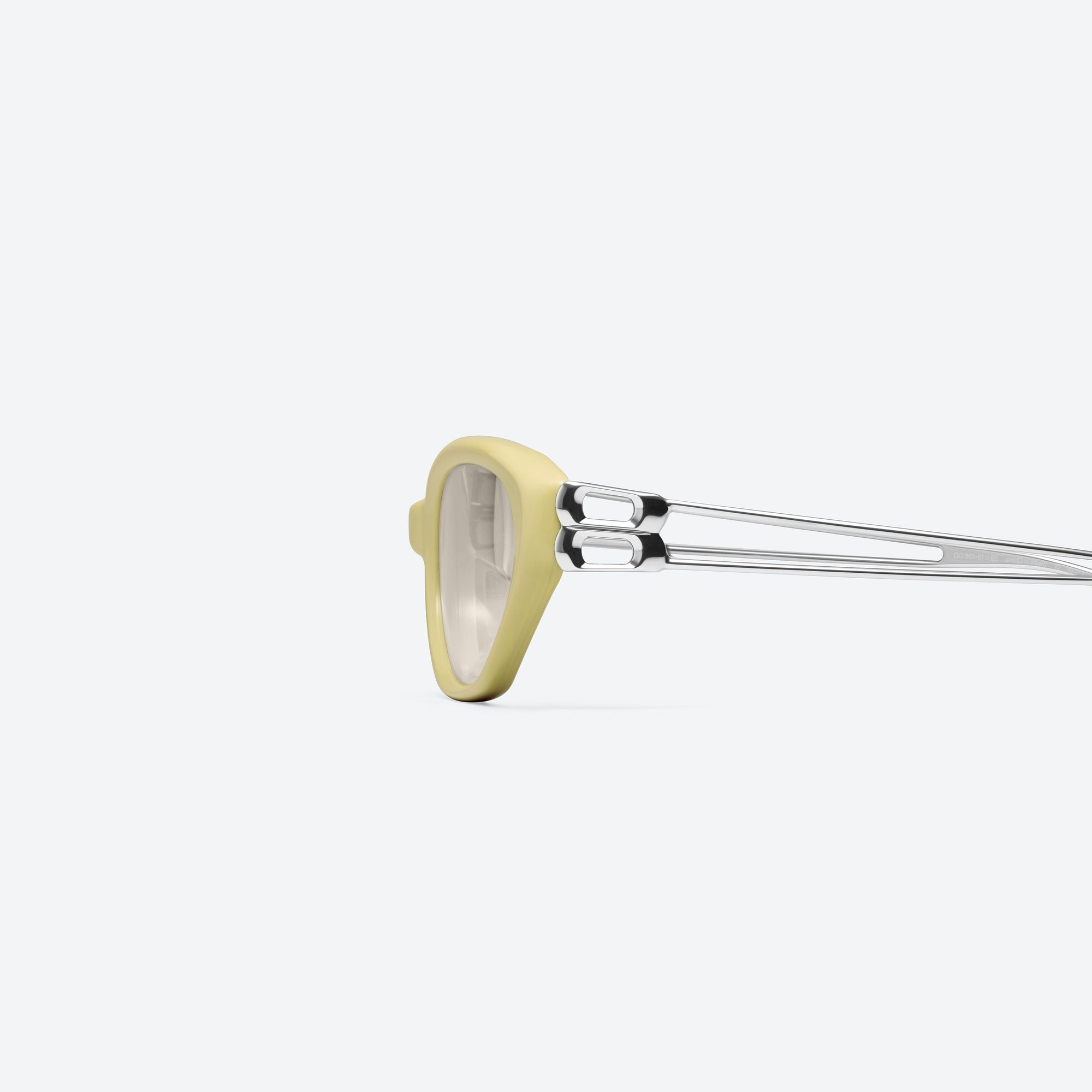 A detailed left view of Gentle Monster Mimosa Y11 Yellow Mixed framed Cat-eye sunglasses.
