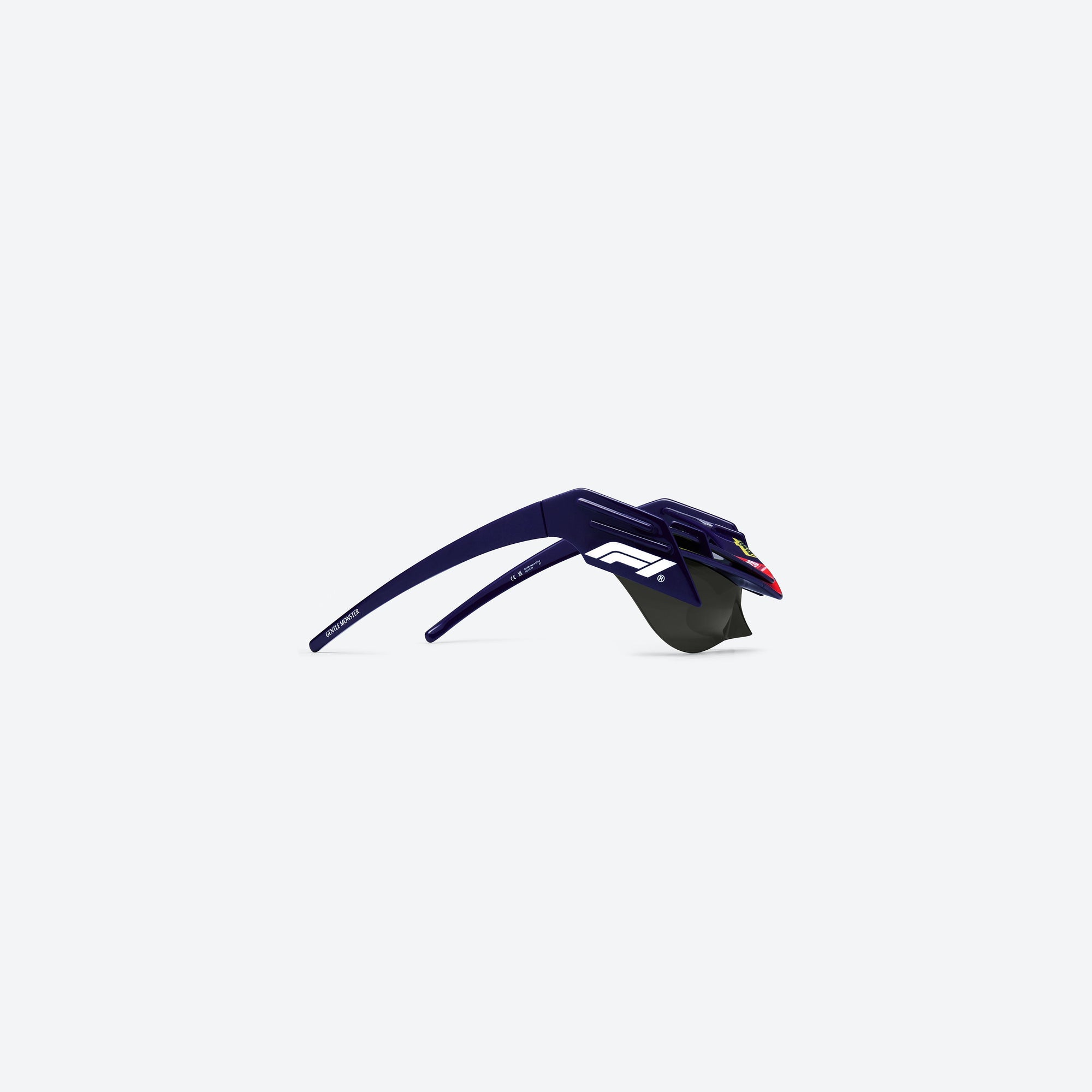 A detailed right view of Gentle Monster Disney F1 - Wing 4 N8 Blue Nylon framed Wraparound sunglasses.