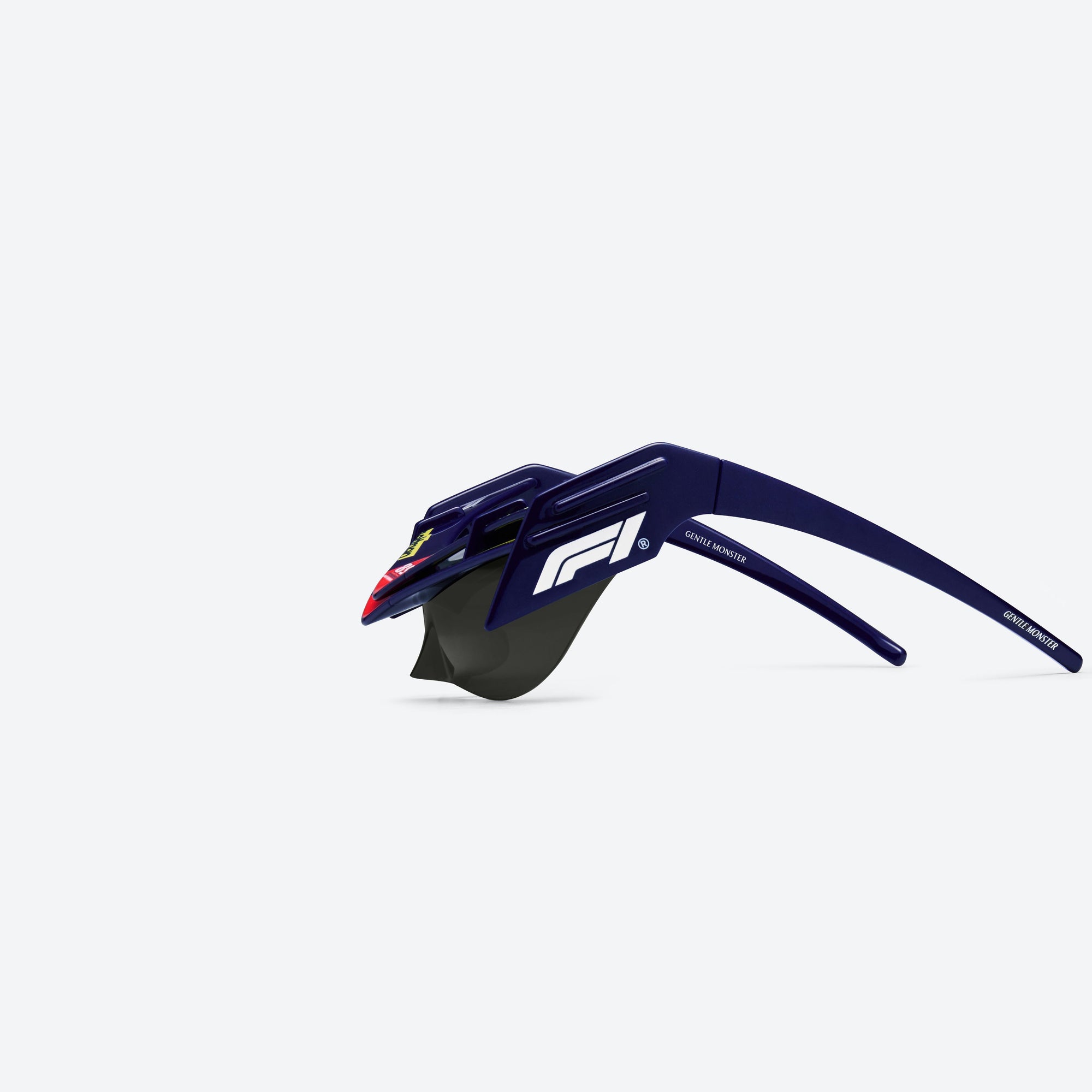 A detailed left view of Gentle Monster Disney F1 - Wing 4 N8 Blue Nylon framed Wraparound sunglasses.