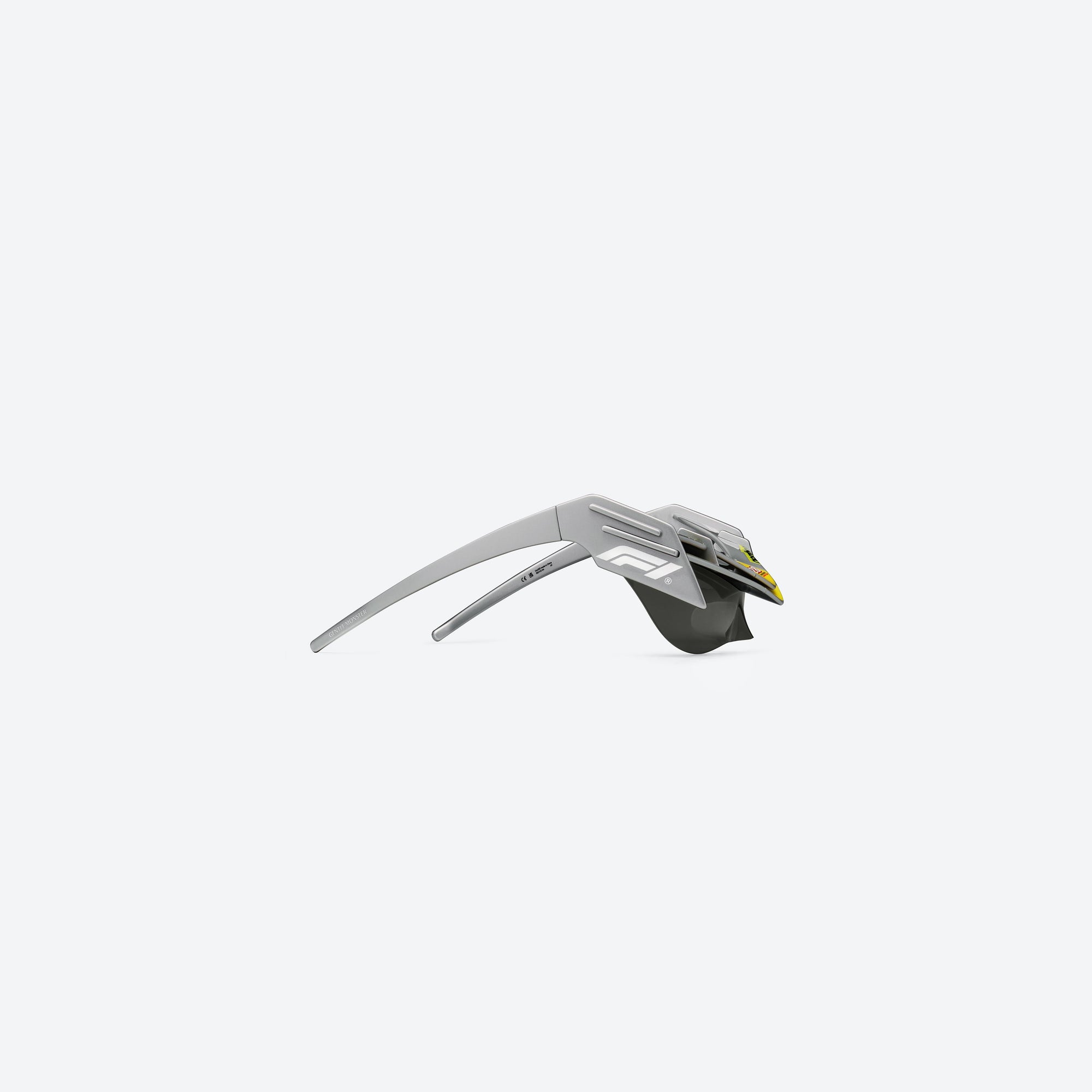 A detailed right view of Gentle Monster Disney F1 - Wing 4 G21 Gray Nylon framed Wraparound sunglasses.