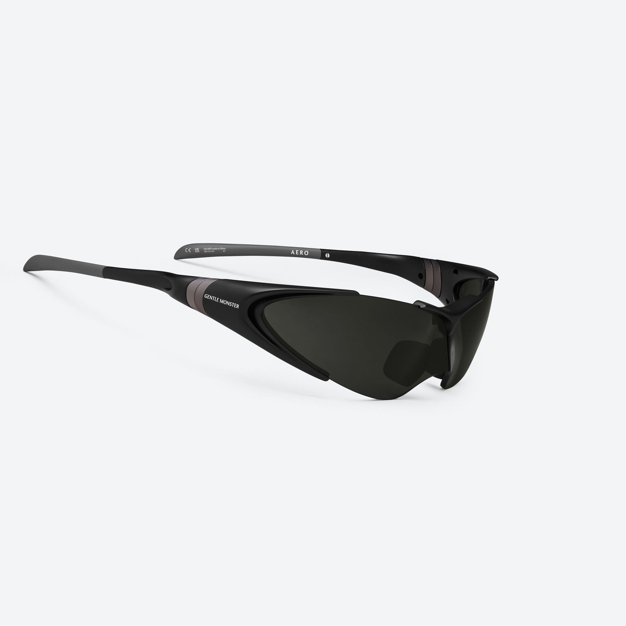 45-degree detailed view of Gentle Monster Disney F1 - Aero M01 Black Nylon framed Wraparound sunglasses.