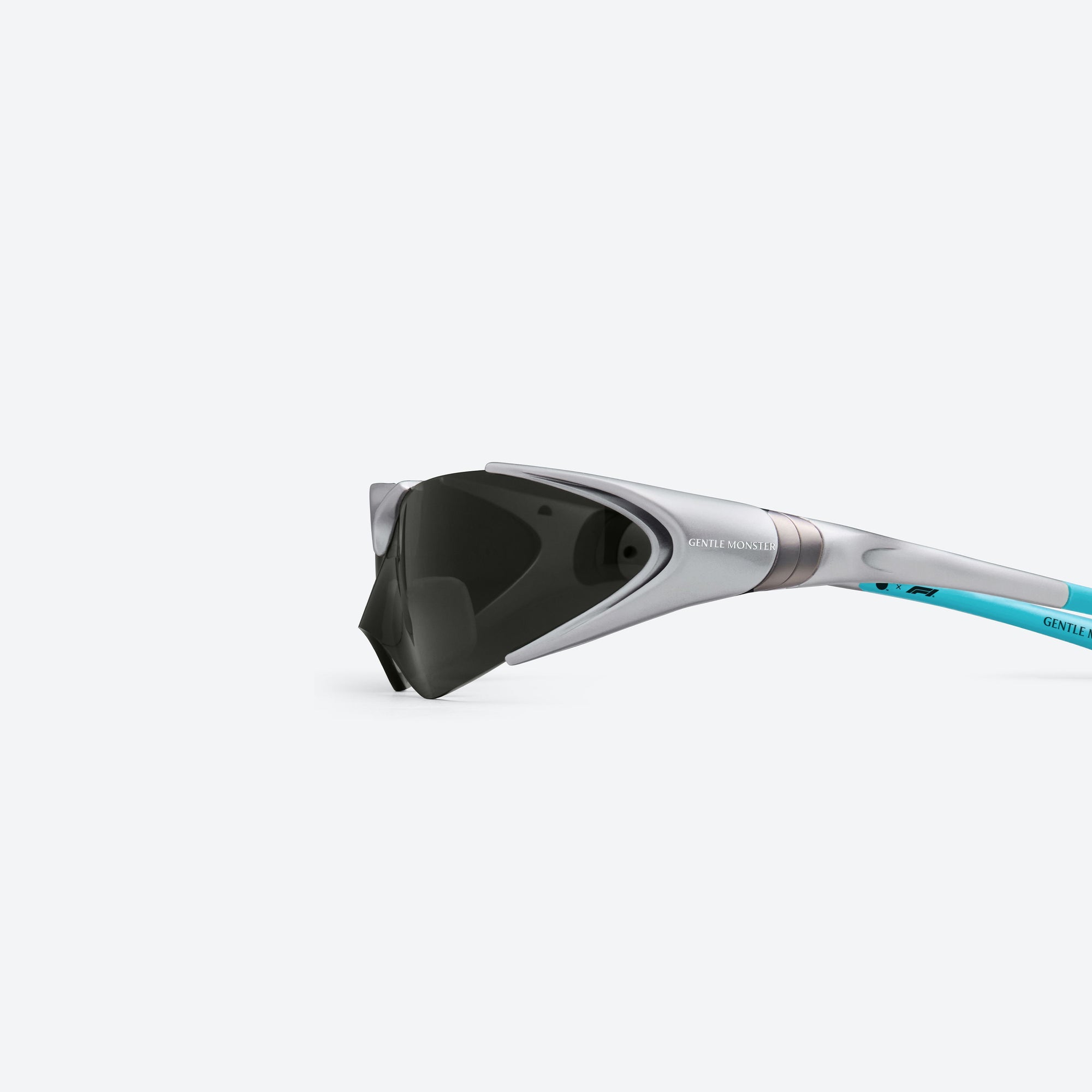 A detailed left view of Gentle Monster Disney F1 - Aero G21 Gray Nylon framed Wraparound sunglasses.