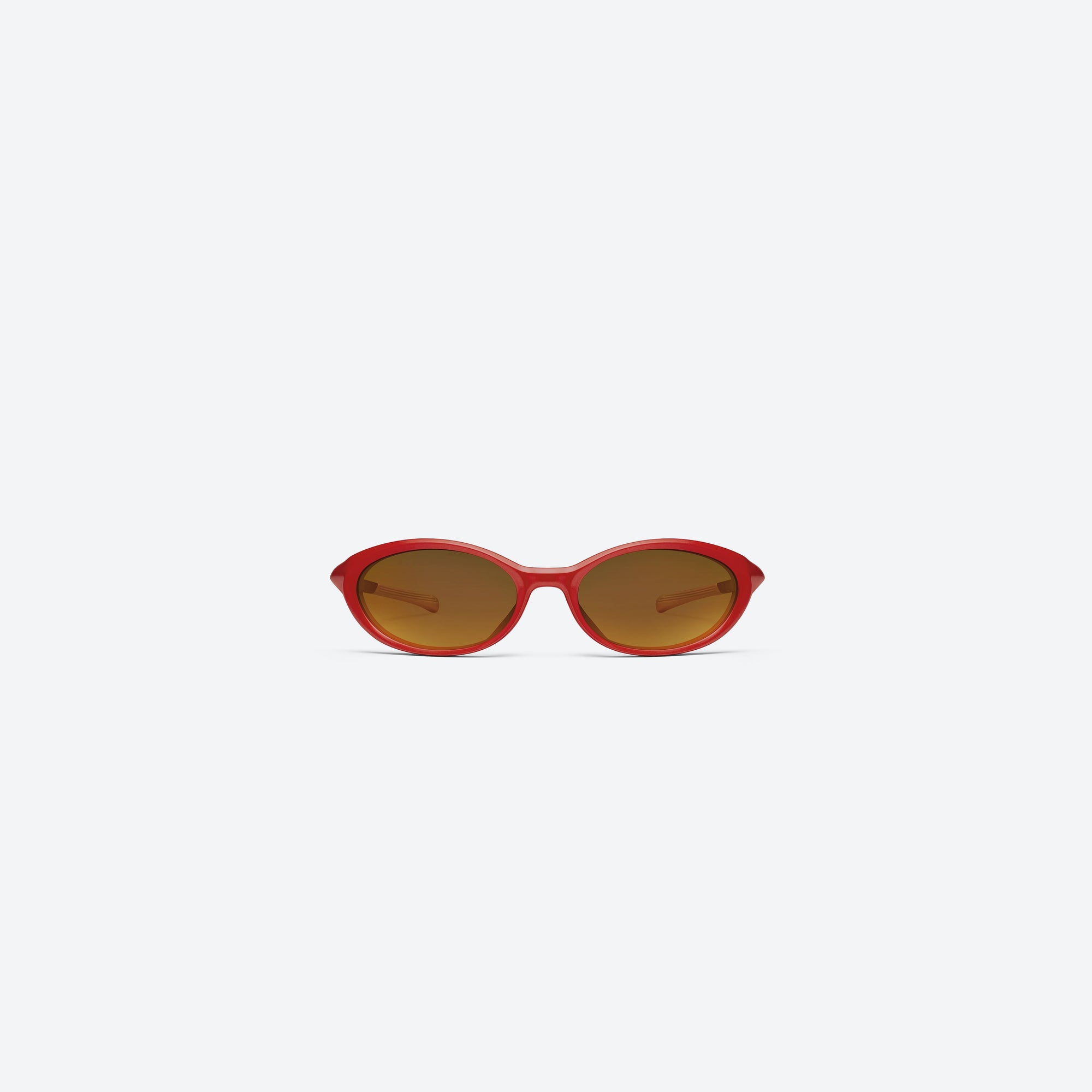 A front view of Gentle Monster Disney F1 - Rim R13 Red Nylon framed Wraparound sunglasses.