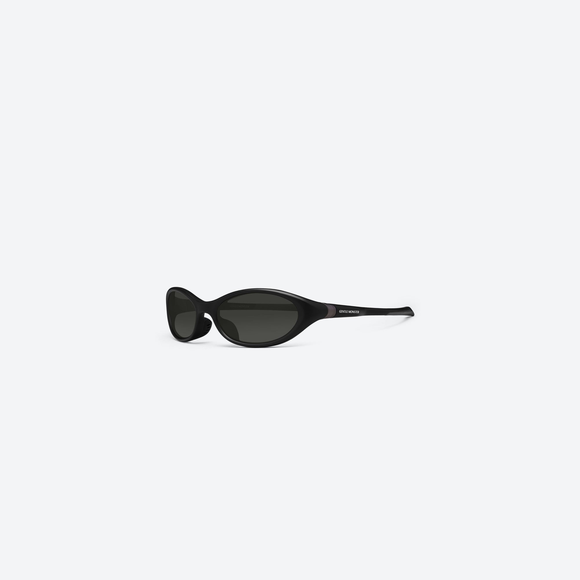45-degree view of Gentle Monster Velo M01 Black Nylon framed Wraparound sunglasses.