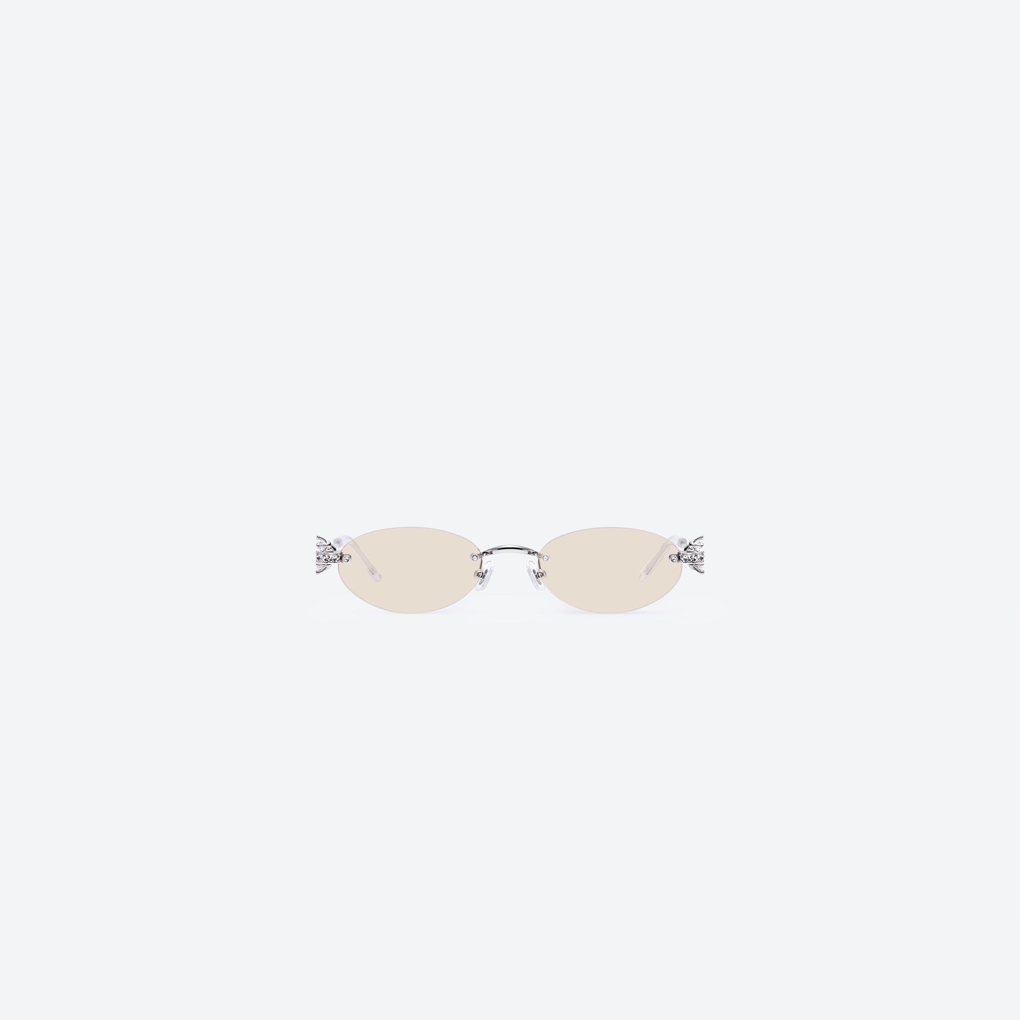 A front view of Gentle Monster Orora 02(BRM) Silver Metal framed Oval sunglasses.