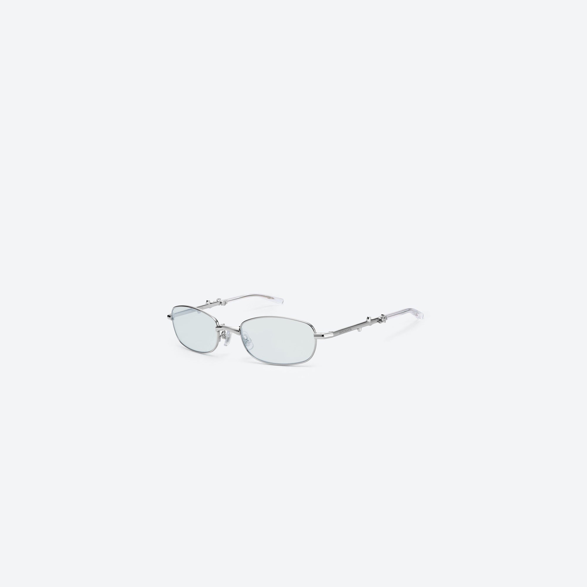 45-degree view of Gentle Monster Mori 02(GR) Silver Metal framed Square sunglasses.