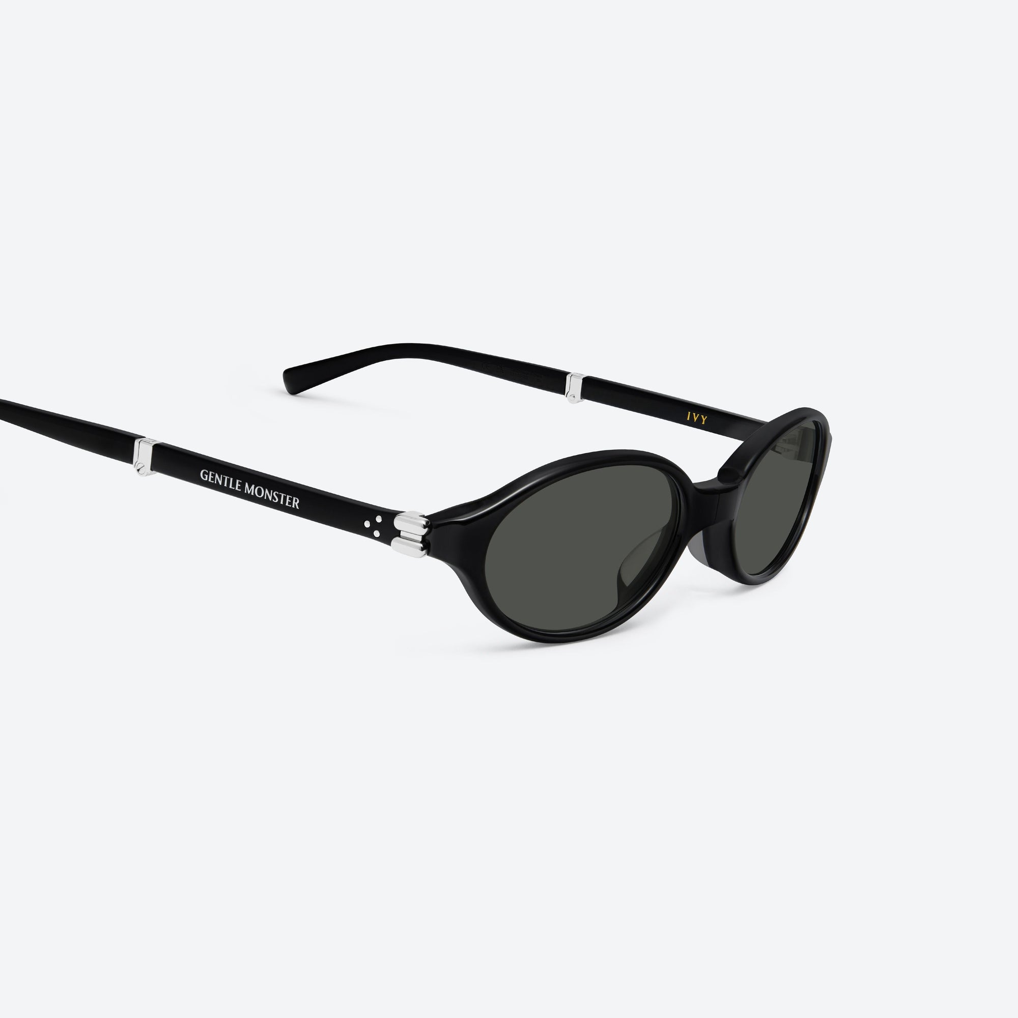 45-degree detailed view of Gentle Monster Ivy 01 Black Acetate framed Oval sunglasses.