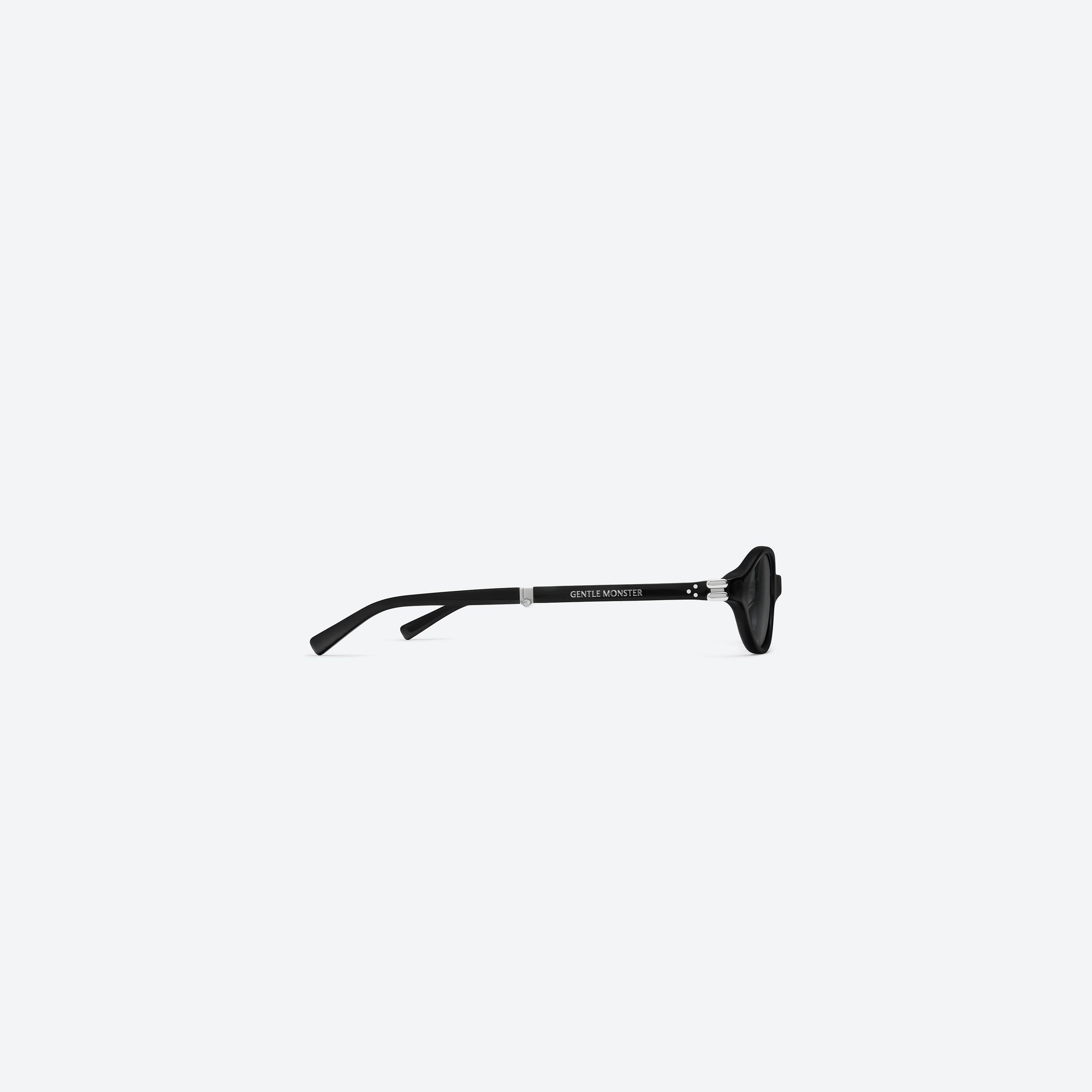A detailed right view of Gentle Monster Ivy 01 Black Acetate framed Oval sunglasses.