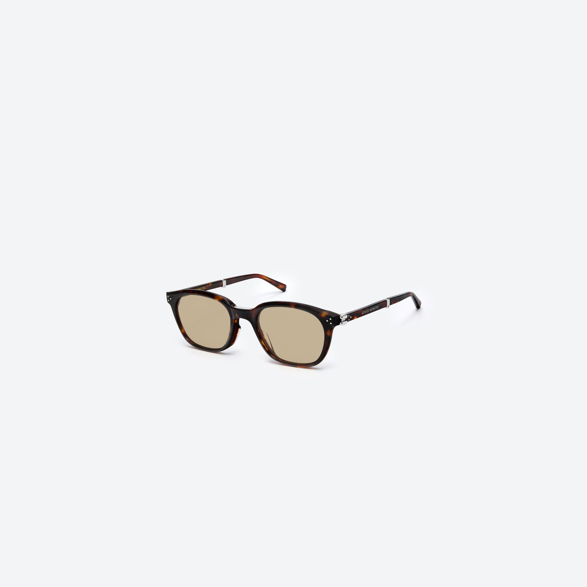 45-degree view of Gentle Monster Jasmin T1 Tortoise Acetate framed Square sunglasses.