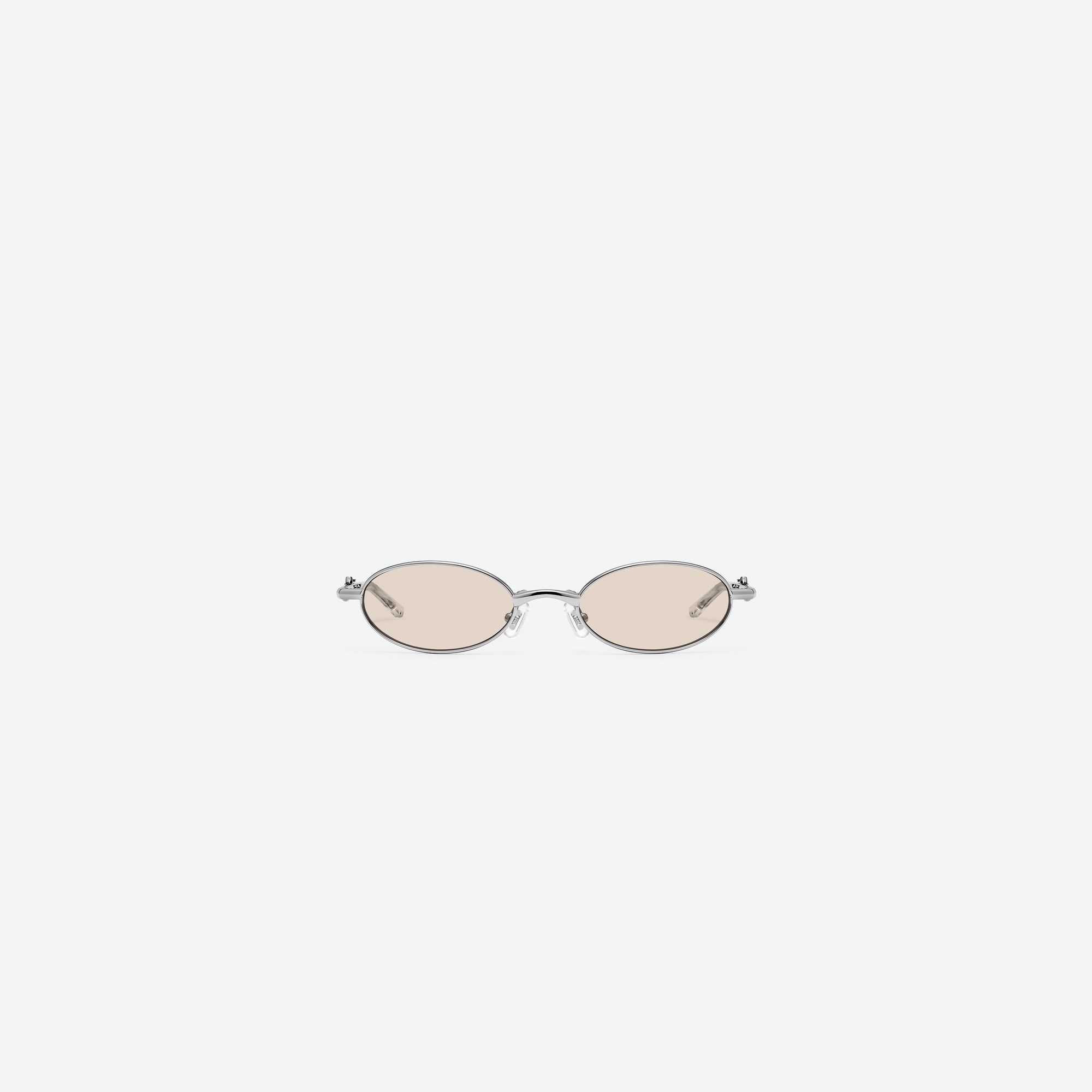 A front view of Gentle Monster Radi 02(BR) Silver Metal framed Oval sunglasses.
