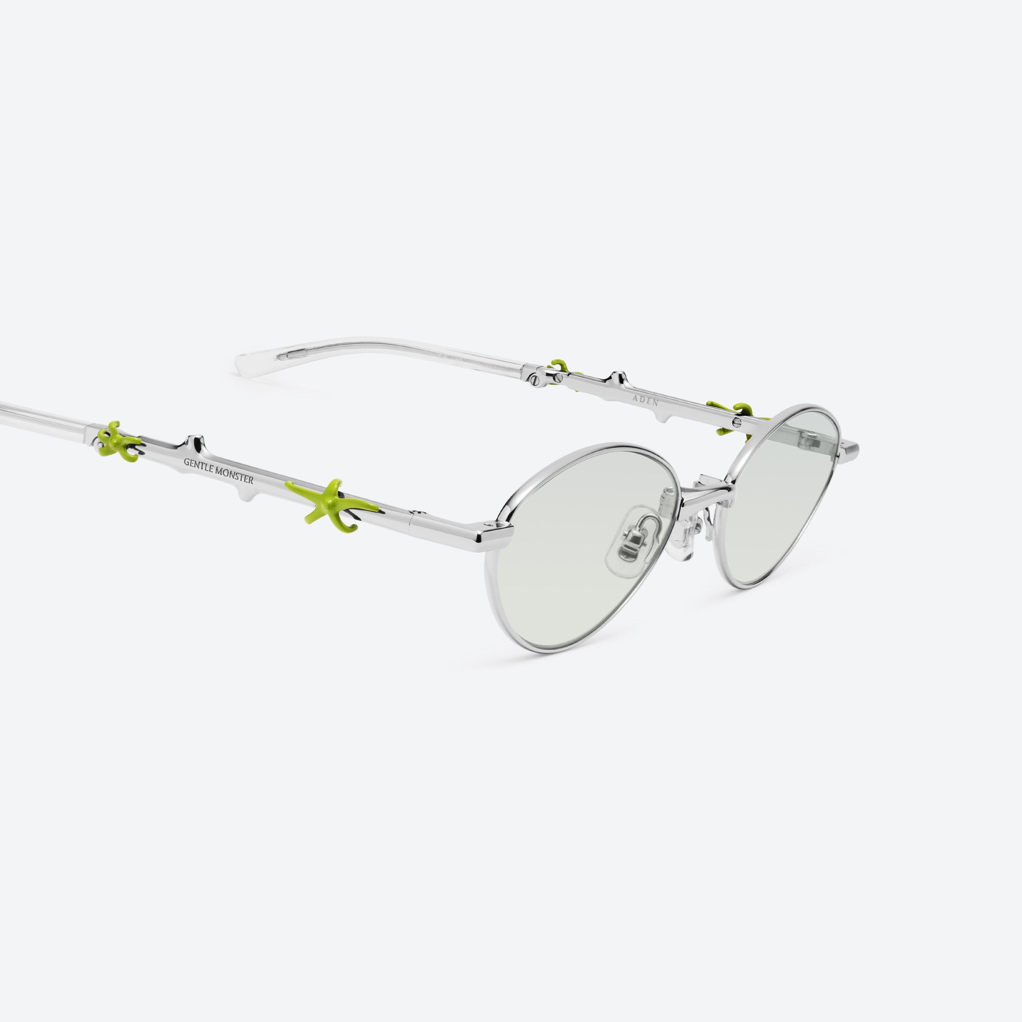 45-degree detailed view of Gentle Monster Aden 02(GRM) Silver Metal framed Oval sunglasses.