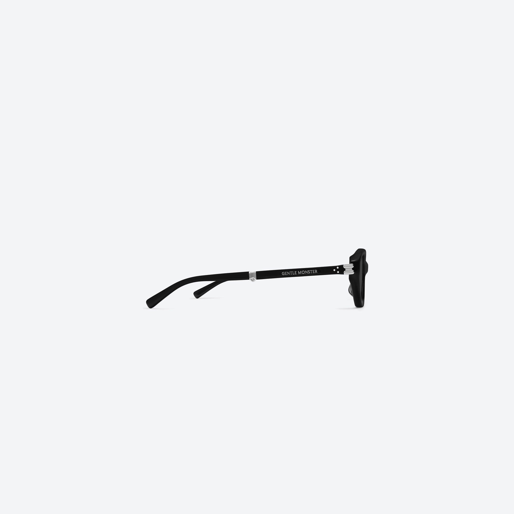 A detailed right view of Gentle Monster Zest 01 Black Acetate framed Oval sunglasses.