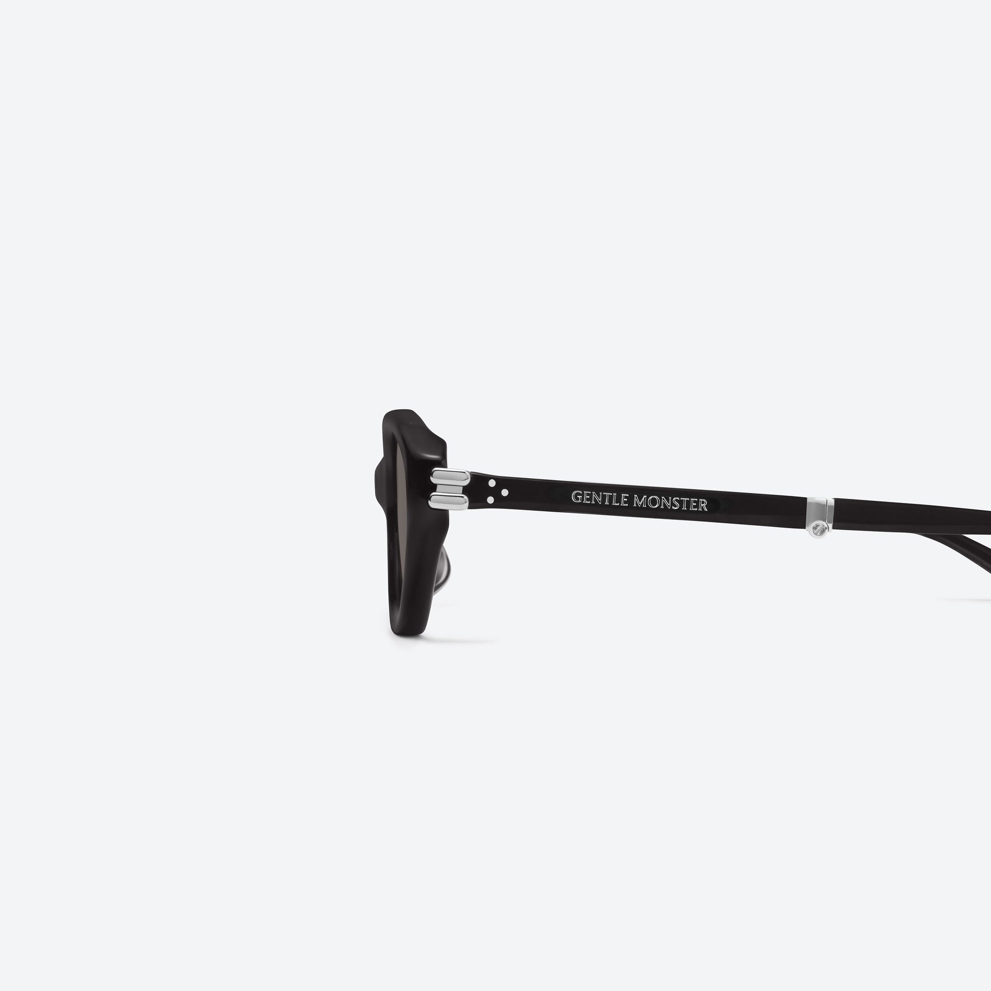 A detailed left view of Gentle Monster Zest BR2 Brown Acetate framed Oval sunglasses.