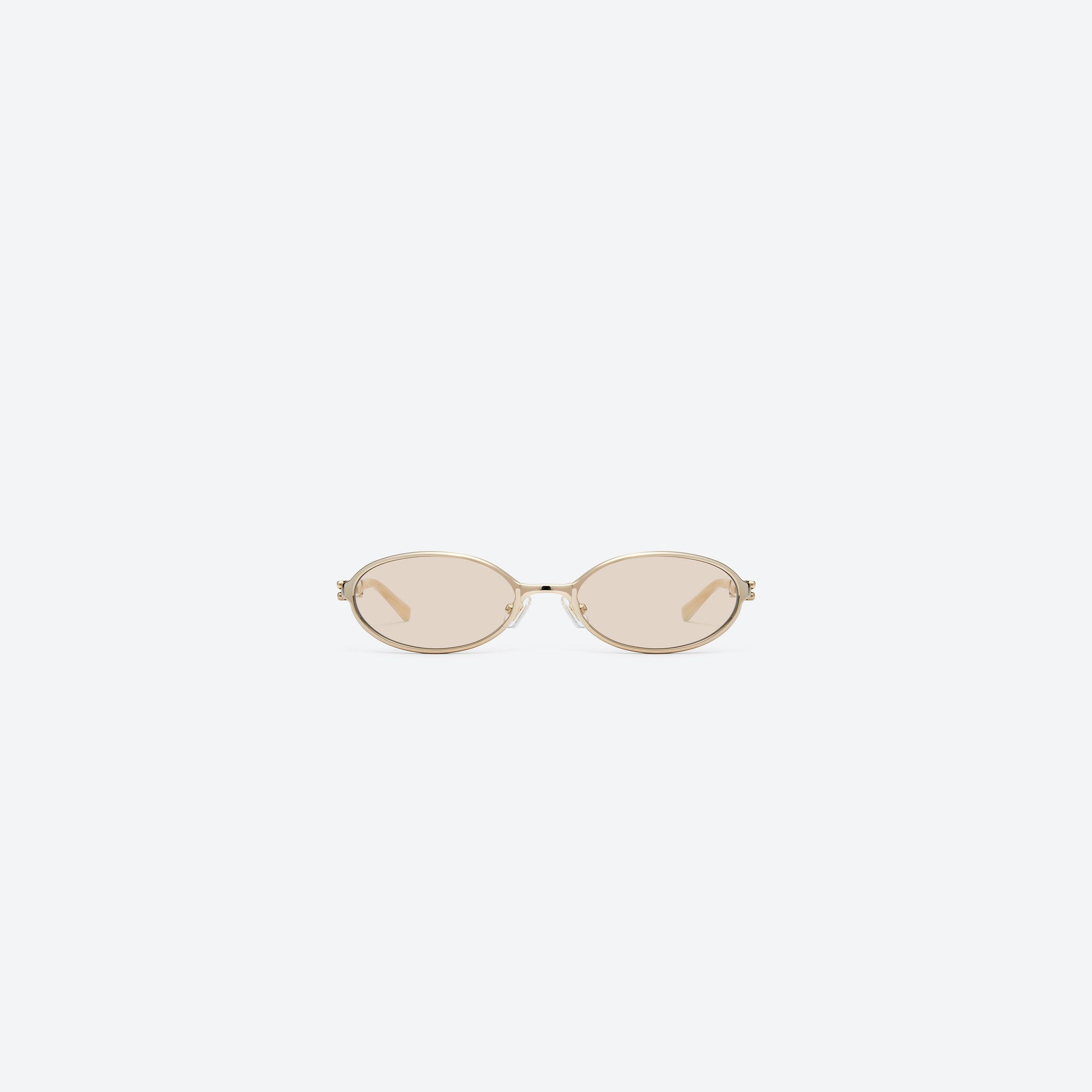 A front view of Gentle Monster Oatt 031 Gold Mixed framed Oval sunglasses.
