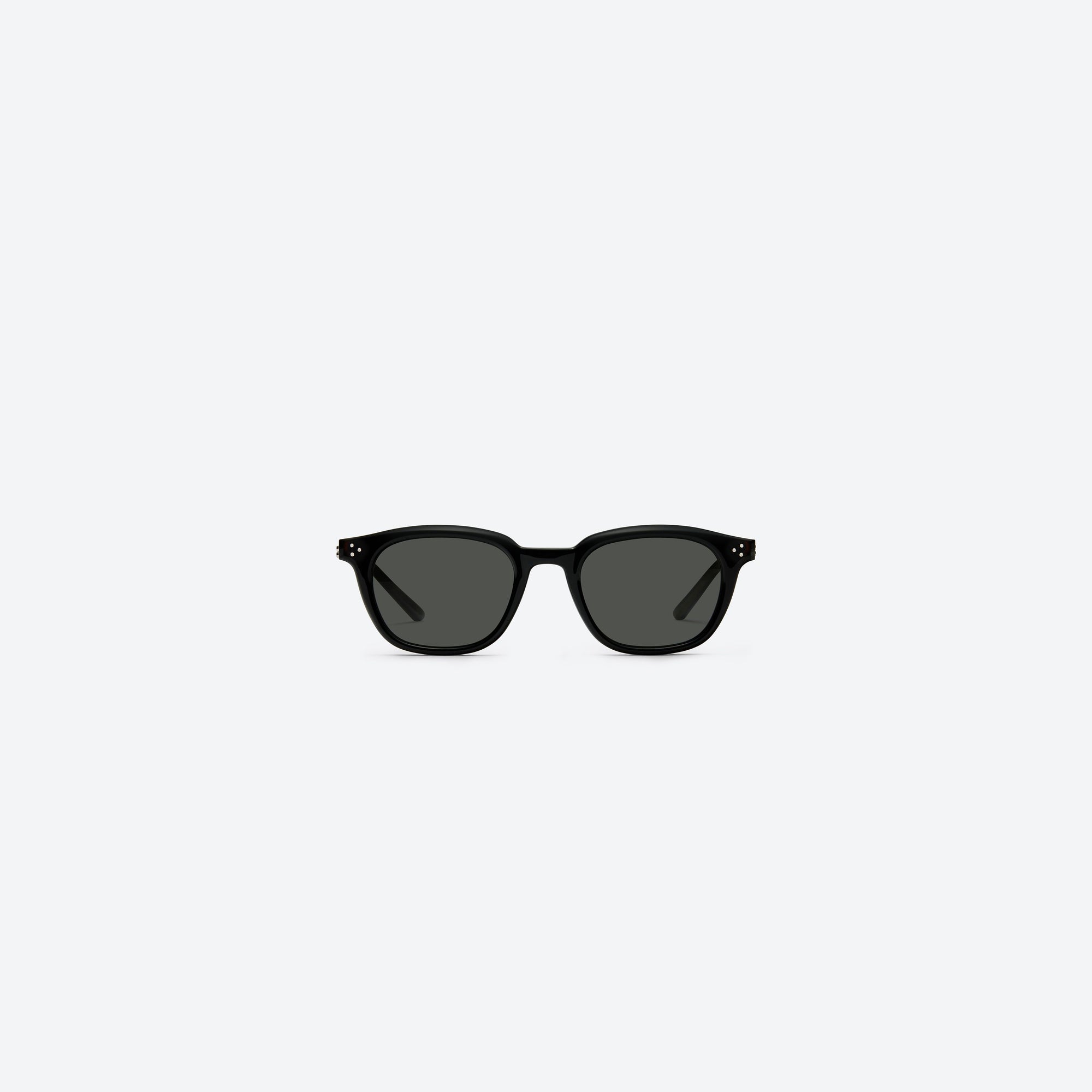 A front view of Gentle Monster Noho.s 01 Black Acetate framed Round sunglasses.