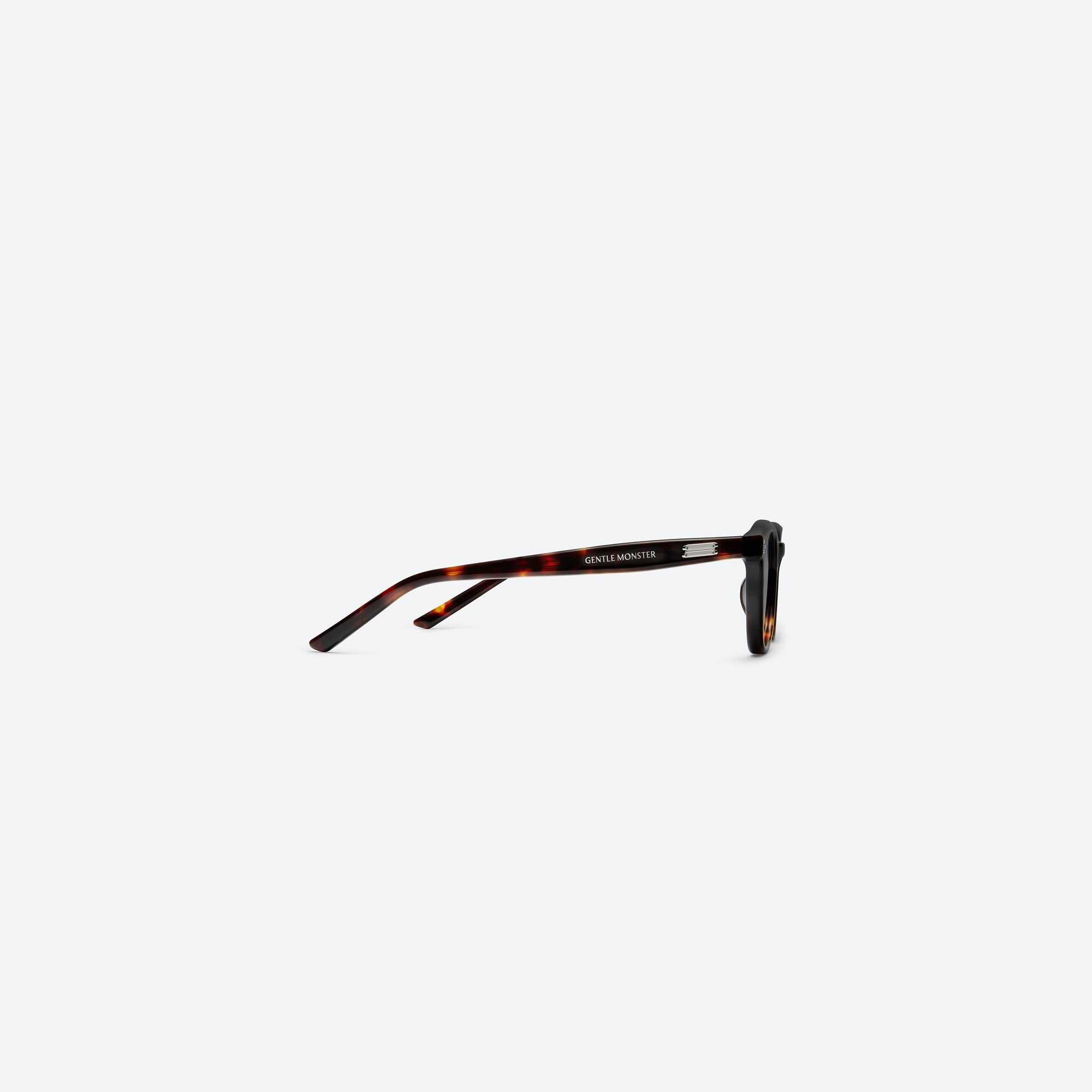 A detailed right view of Gentle Monster Noho.s T1 Tortoise Acetate framed Round sunglasses.
