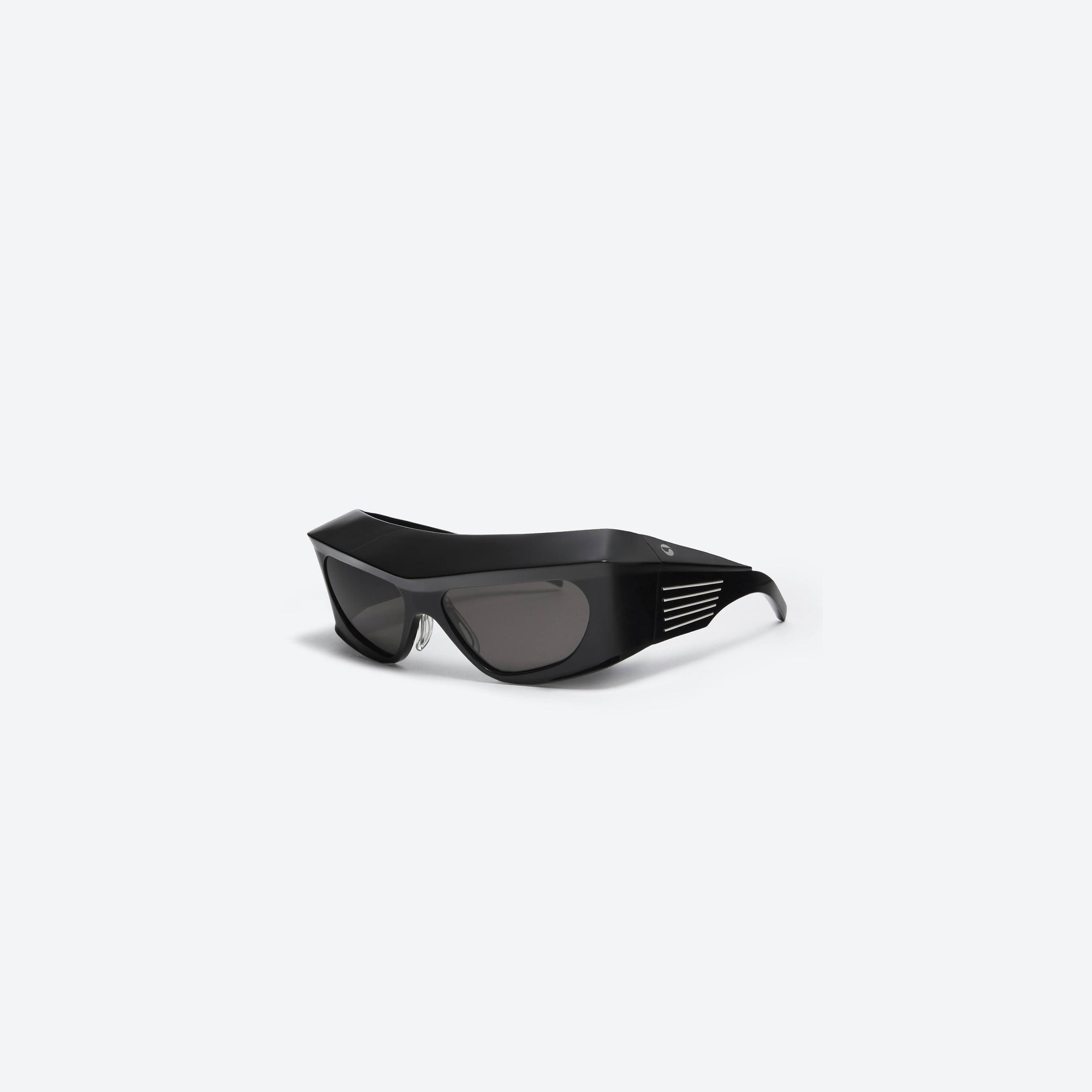 45-degree view of Gentle Monster Coperni - 5G BOLD 01 Black Acetate framed Wraparound sunglasses.