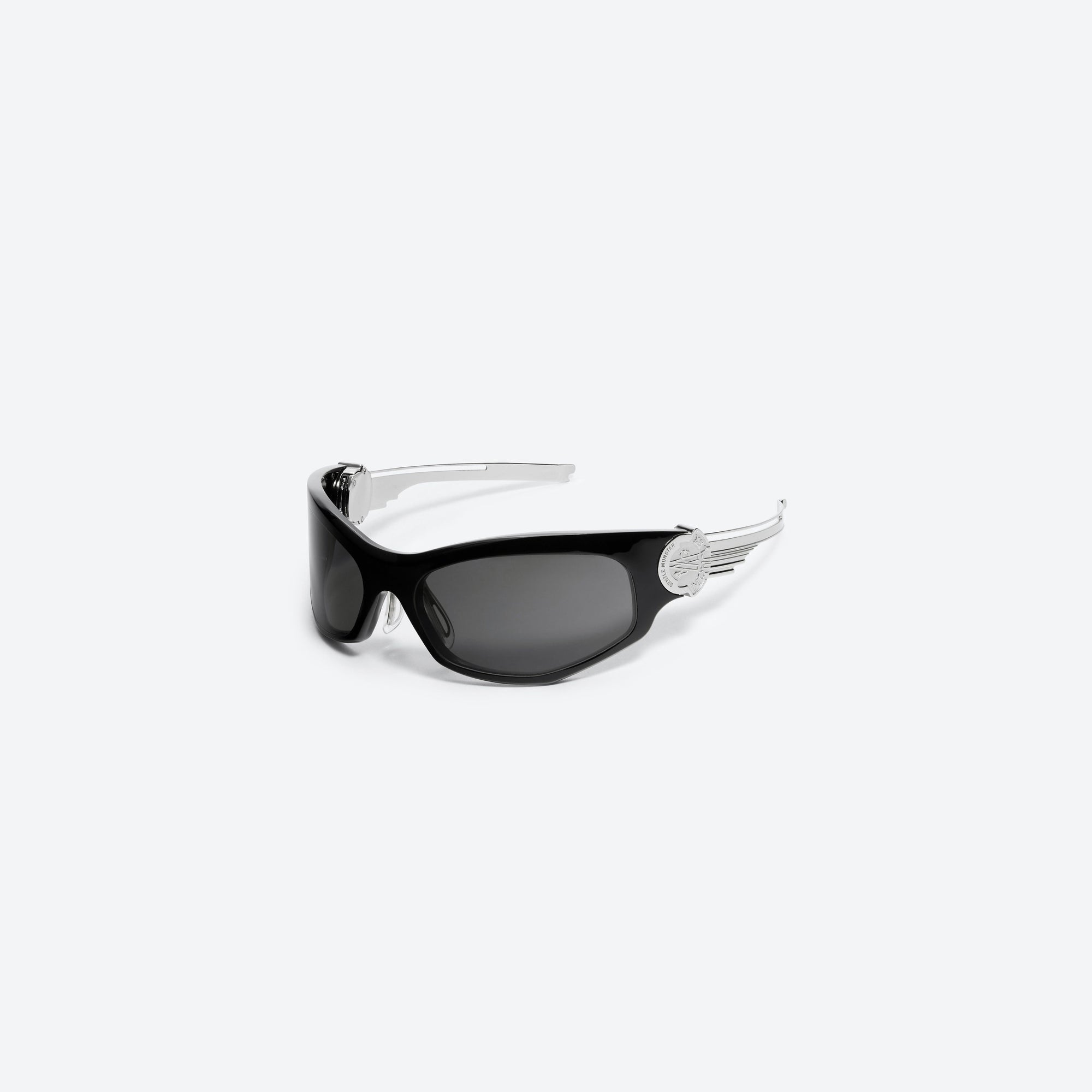 45-degree view of Gentle Monster Moncler - Swipe 1 01 Black Mixed framed Wraparound sunglasses.