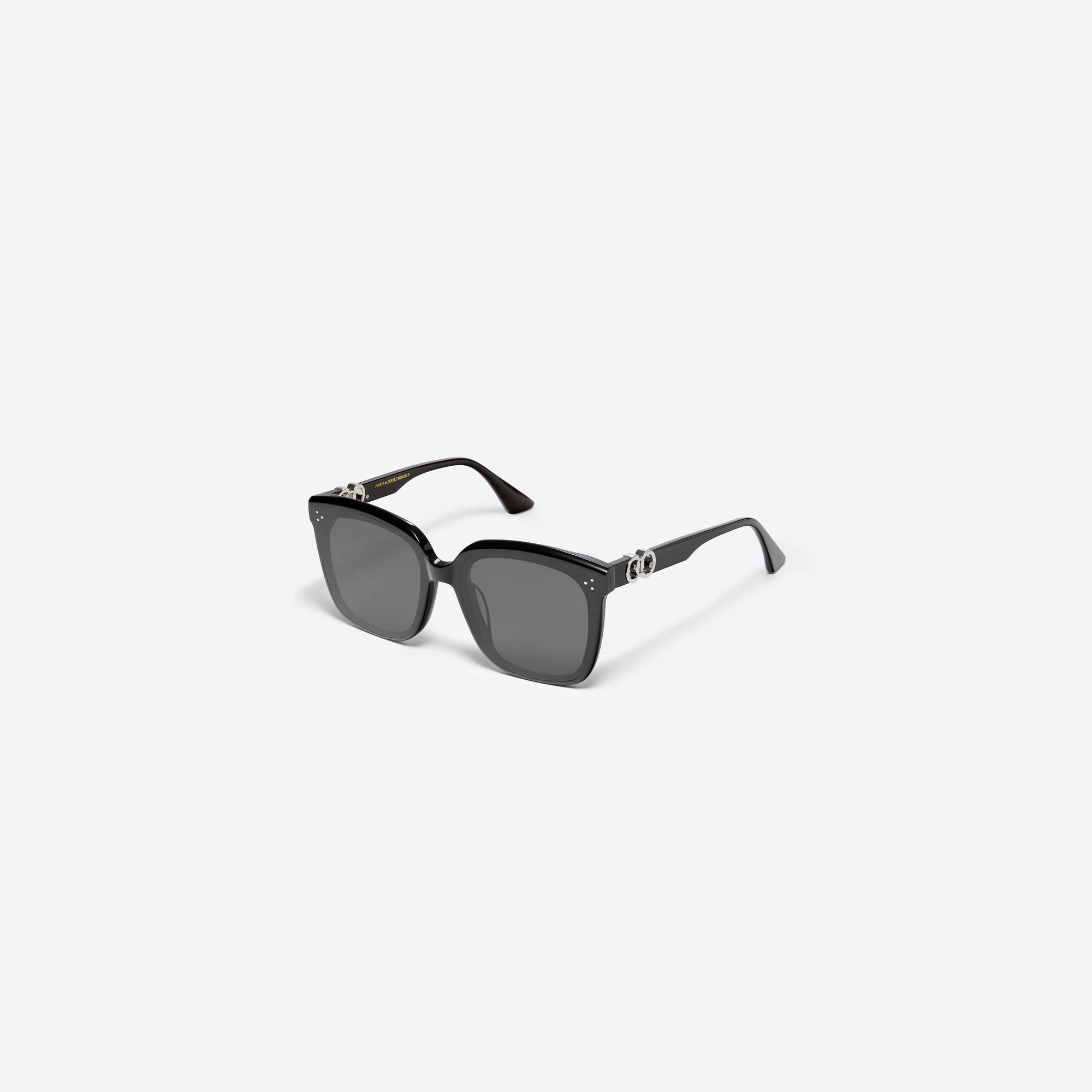 45-degree view of Gentle Monster Jennie - Angel 01 Black Mixed framed Square sunglasses.